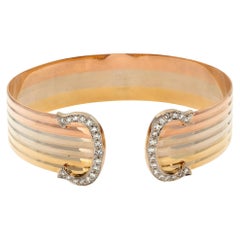 Yellow, white, & rose gold "C de Cartier" tricolor cuff bangle w/ pave diamond