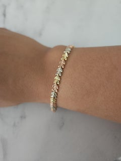 Yellow, White, & Rose Gold Leaf Design Bracelet with Diamond Cuts 14k Gold