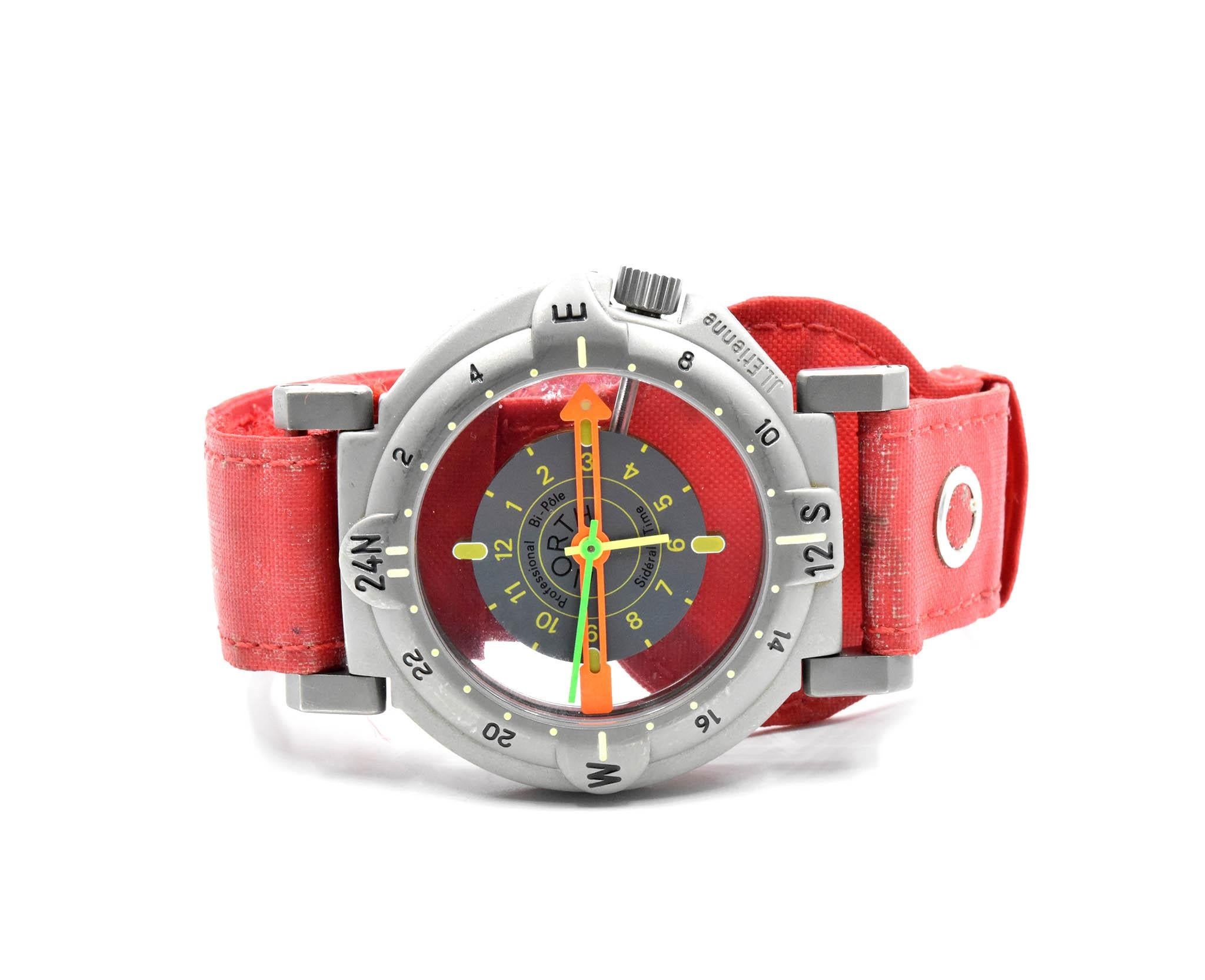 Movement: French FE7020 quartz movement
Function: hours, minutes, sidereal solar sighting anti-magnetic compass
Case: round 48mm solid titanium case with reversible front (north pole) & back (south pole) faces, solid sapphire crystal faces: