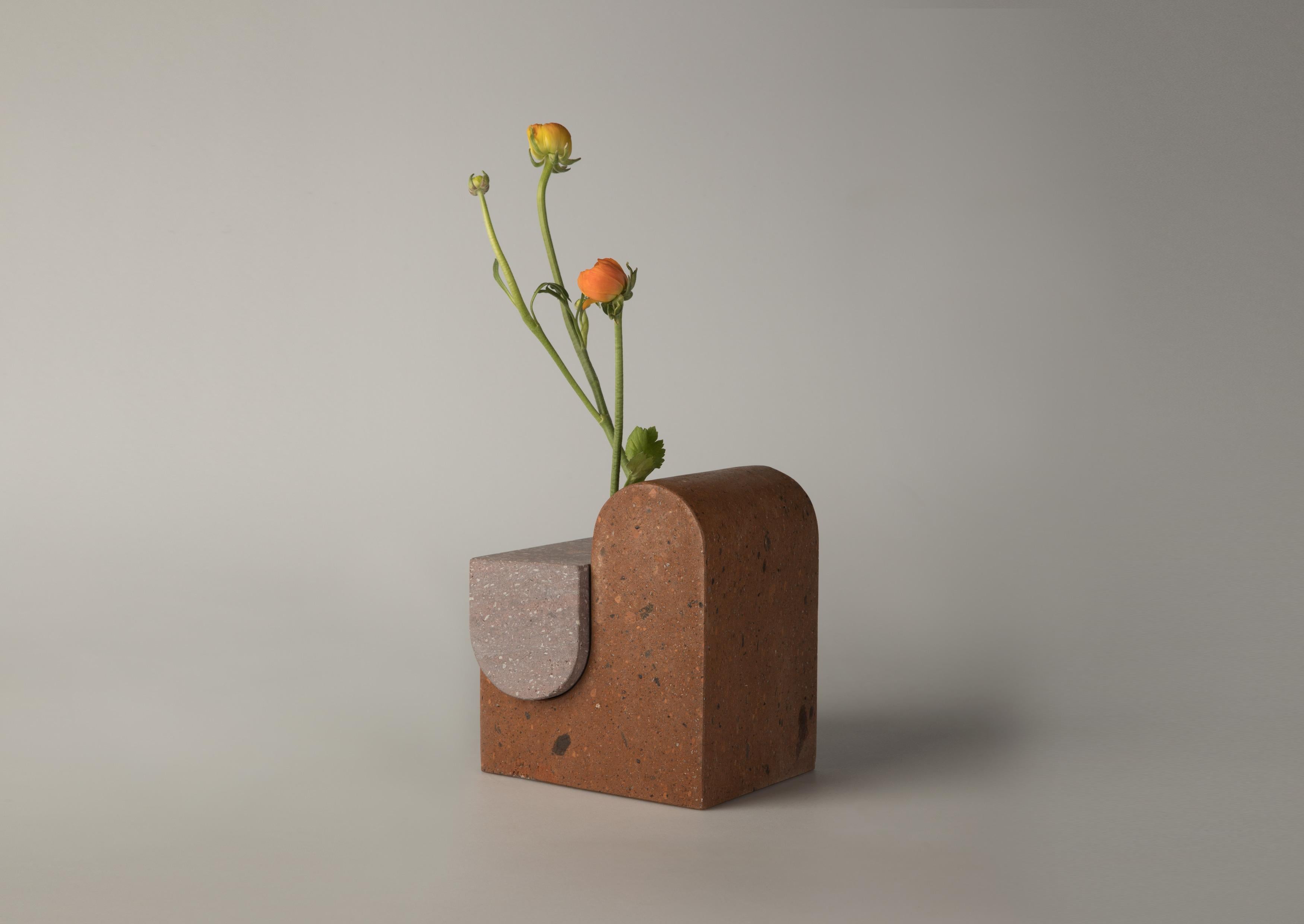 Yerevan vase by Sanna Völker
Materials: Armenian tuff & basalt (volcanic rock)
Dimensions: 19 x 17 x 15 cm

The Yerevan vase by Sanna Völker is a personal memoir of time spent in Armenia. A sculptural interpretation of the contrasts, shapes and