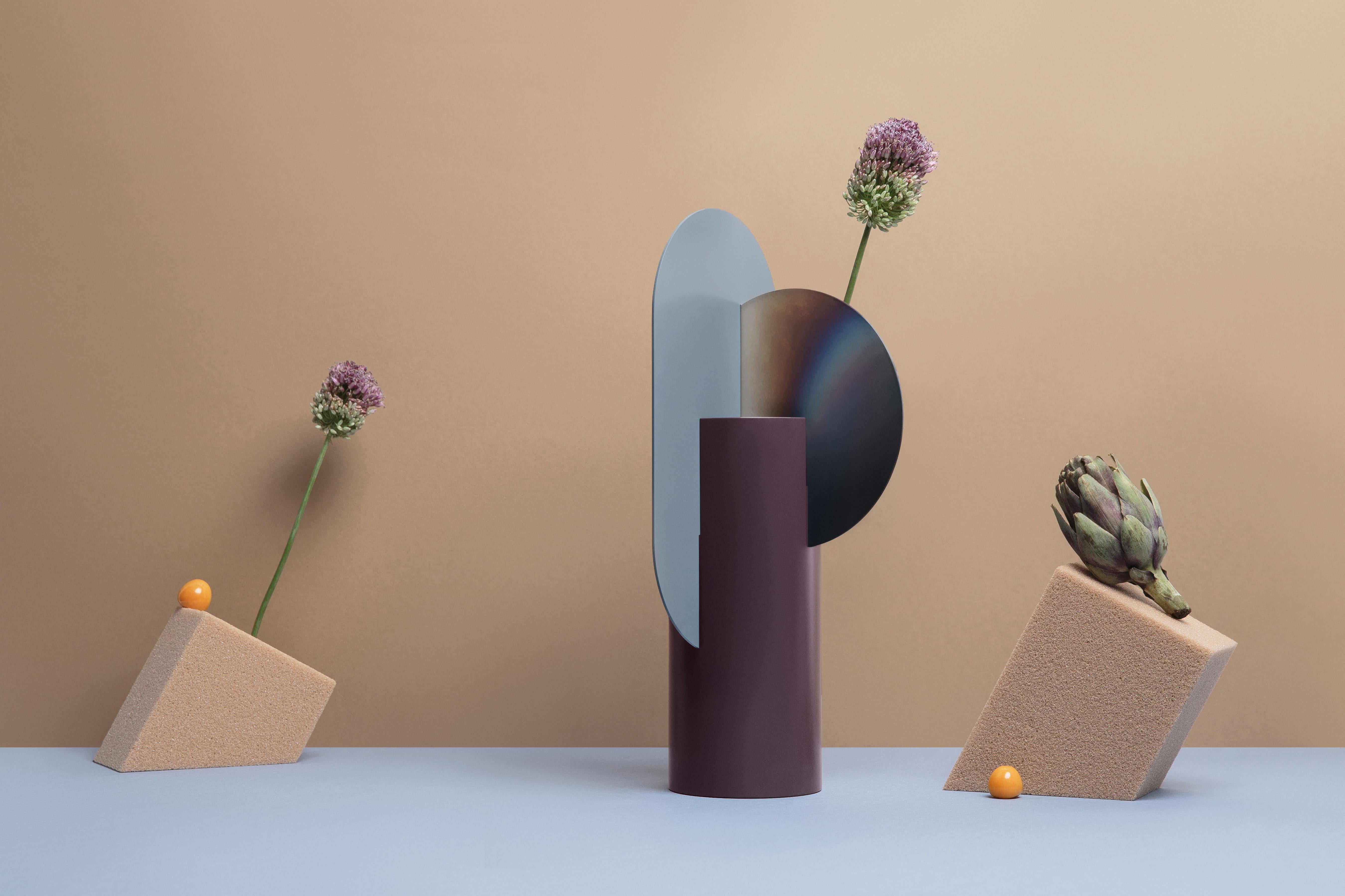 Malevich vase limited edition by NOOM
Limited edition
Dimensions: H 37 cm x W 17.5 cm x D 15 cm
Materials: Burned steel, painted steel

NOOM is a young rapidly growing design company from Ukraine that produces lighting, decor and home