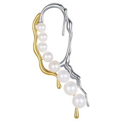 Yesterday's Tomorrow – einzelne ovale Ohrringe aus Gold und Silber