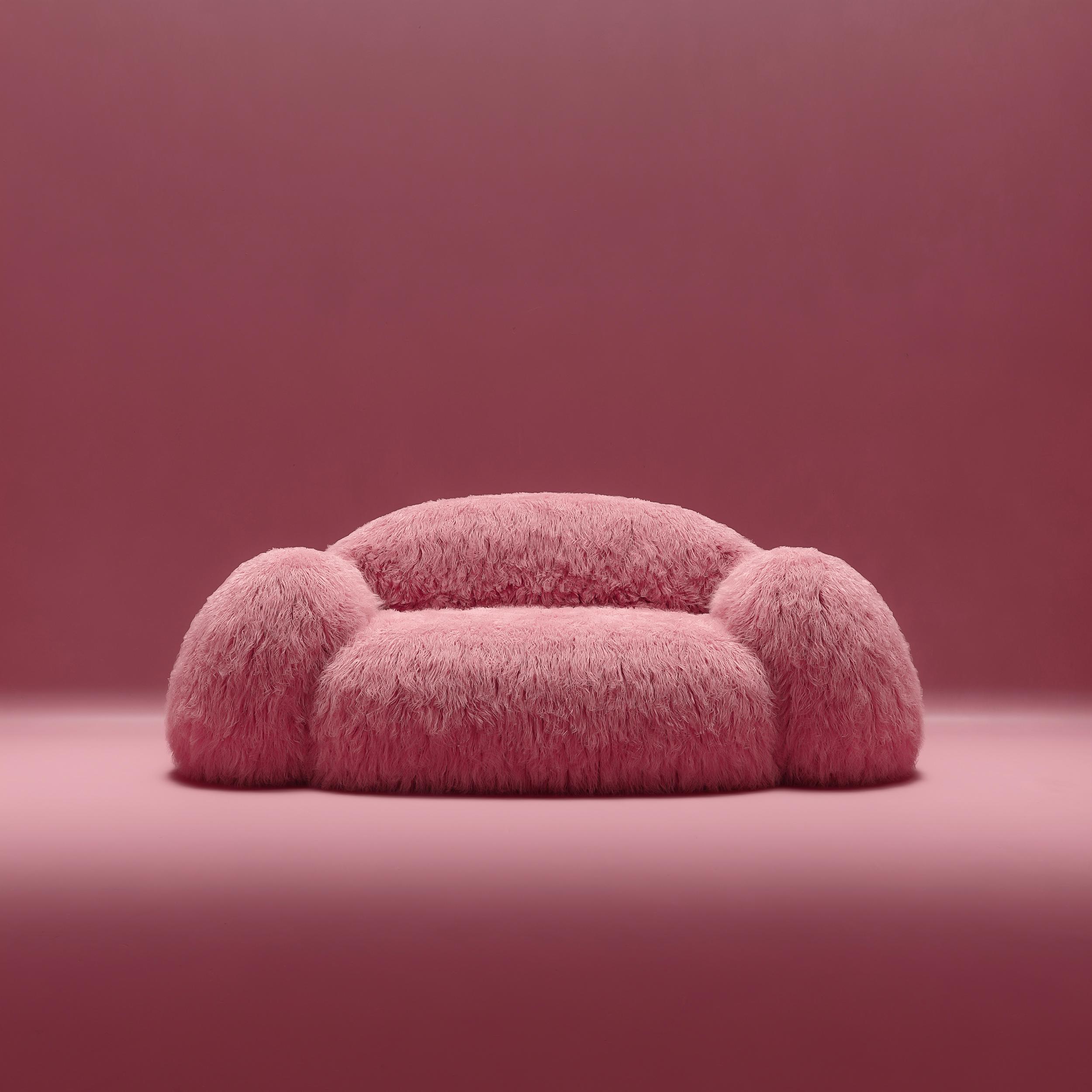 Yeti sofa by NUMO.
Dimensions: H 80 x W 210 x L 110 cm
Materials: Faux Lama Fur

Yeti furniture series – minimalistic and huge, a soft and cozy pink cloud. Its bloated forms seem to cover you with a feeling of comfort, while the faux lama fur just
