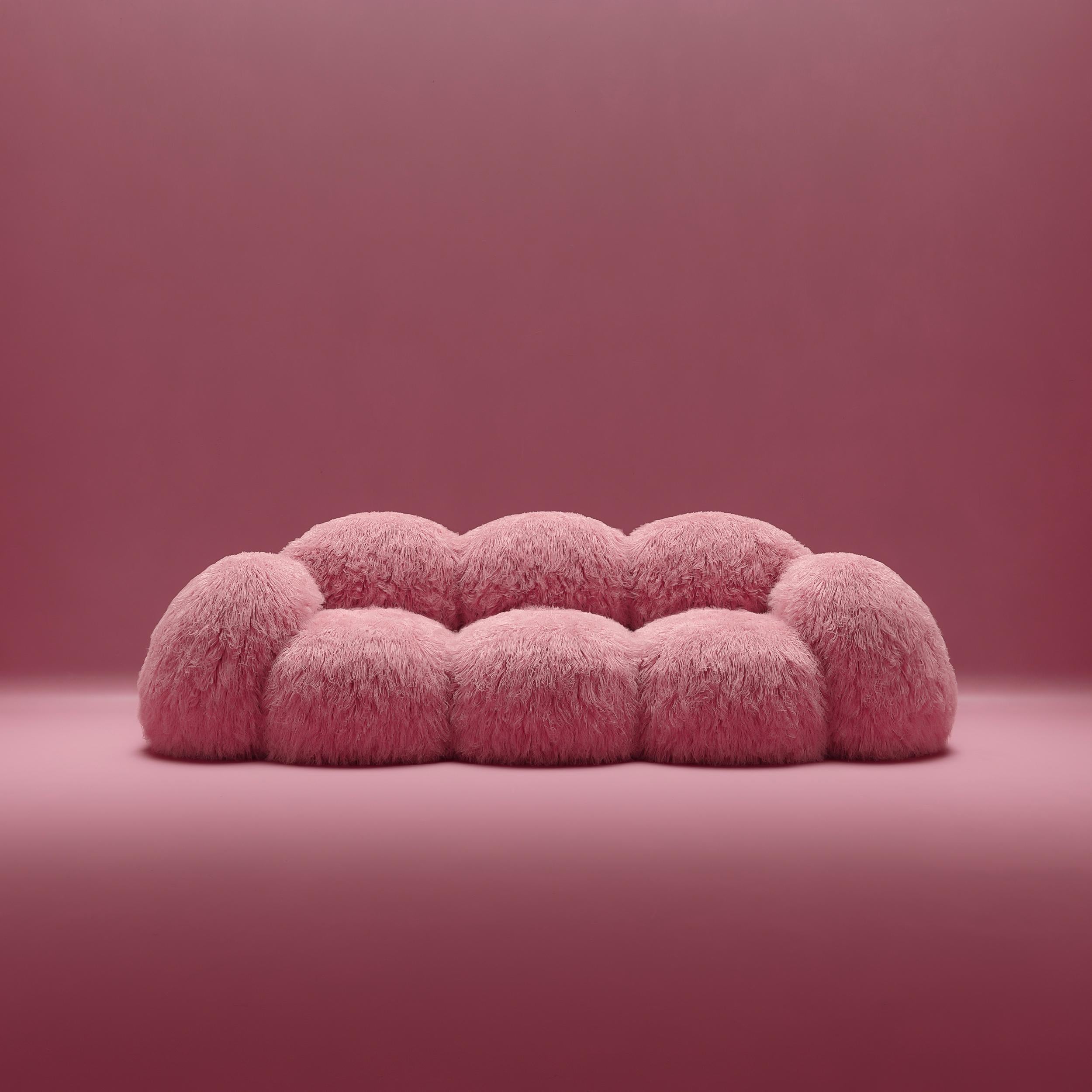 Yeti Triple sofa by Vladimir Naumov
Dimensions: H 79 x W 260 x L 108 cm
Materials: Faux Lama Fur

Yeti furniture series – minimalistic and huge, a soft and cozy pink cloud. Its bloated forms seem to cover you with a feeling of comfort, while the