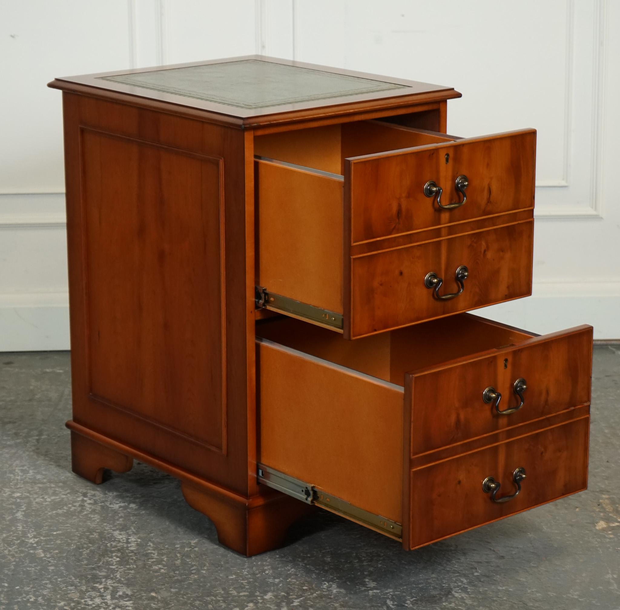 
We are delighted to offer for sale this Lovely Yew Wood Green Leather Top Filing Cabinet.

Made by Brights of Nettlebed is a luxurious and exquisite piece of furniture that exudes elegance and sophistication. The cabinet is crafted from