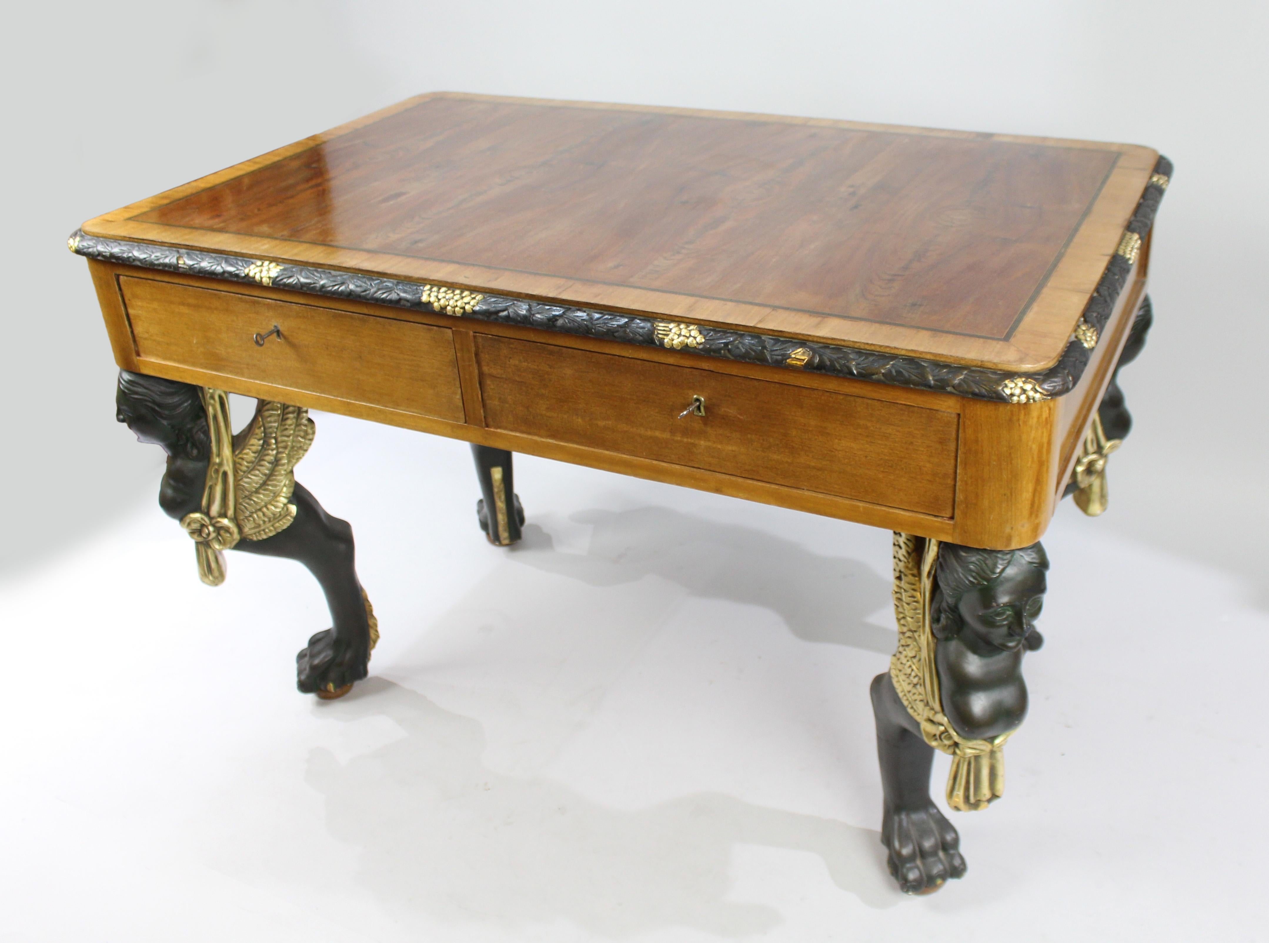 Period 
Mid-20th century

Wood 
Yew wood, mahogany crossbanding, brass inlay, painted legs, gilt details

Condition 
Good condition, lovely color. Sound structure. A few scratches to finish commensurate with age
 

 

Handsome large