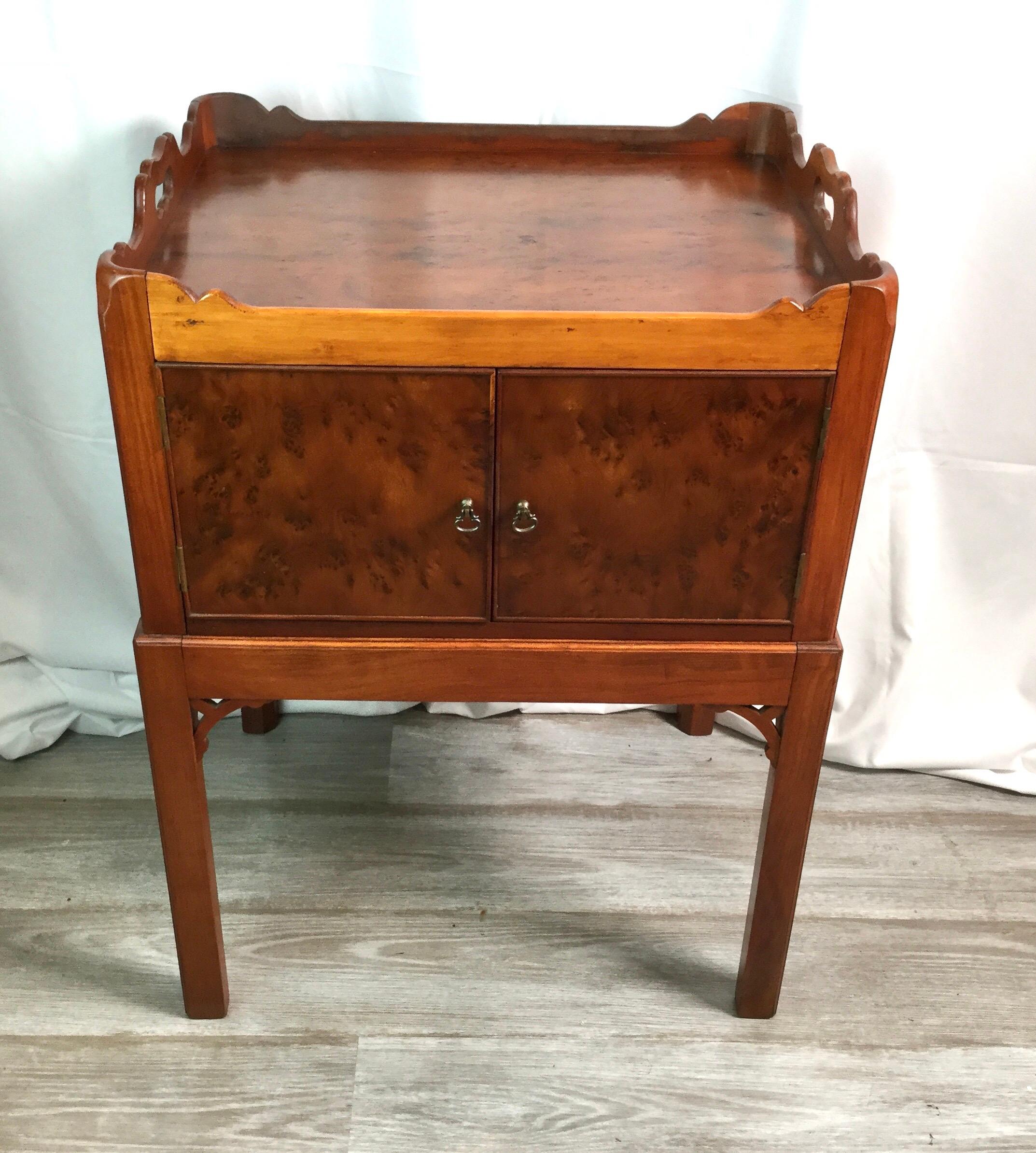 Beautiful Yew wood cabinet on frame with great gallery top. Measures: 20 1/2