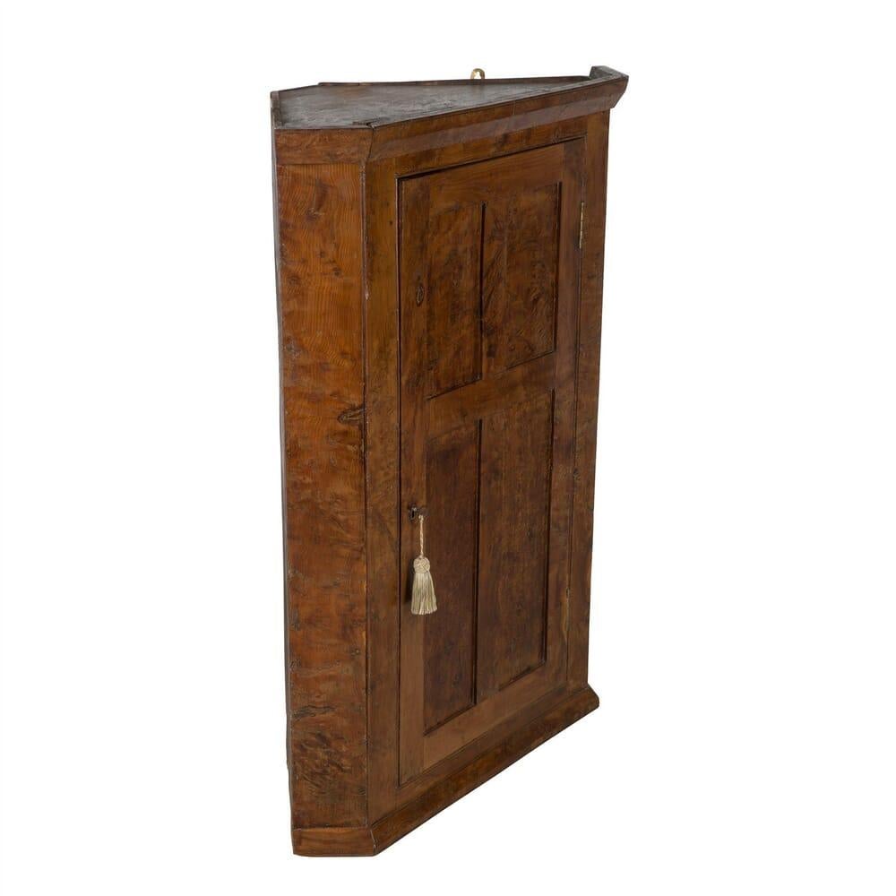 A late 18th century English burr wood corner cupboard in original condition with wonderful patina.