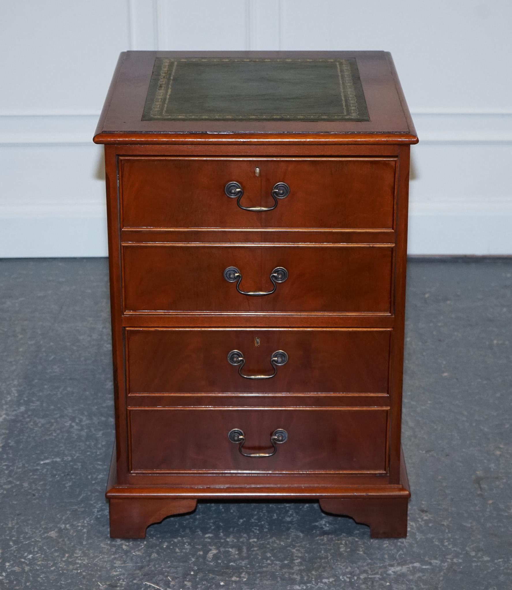 We are delighted to offer for sale this Lovely Mahogany Green Leather Filing Cabinet.

 
This stunning vintage filing cabinet is a true statement piece, featuring a beautiful combination of gold and green. The cabinet boasts two spacious drawers,
