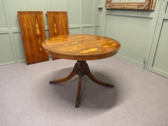Yew Wood Pedestal Dining Table Extends to Seat 10