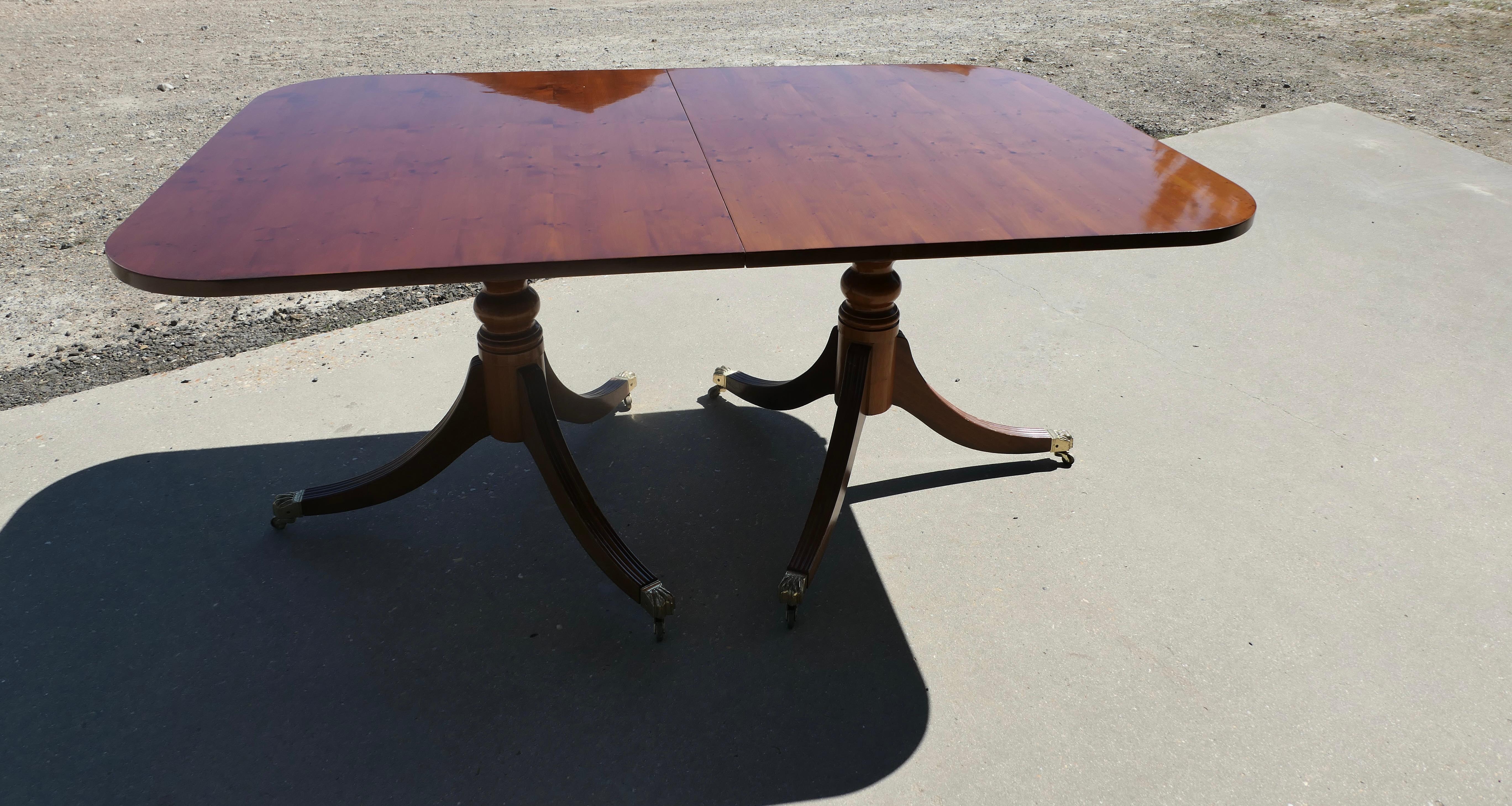 20th Century Yew Wood Pedestal Dining Table Extends to Seat 14 For Sale