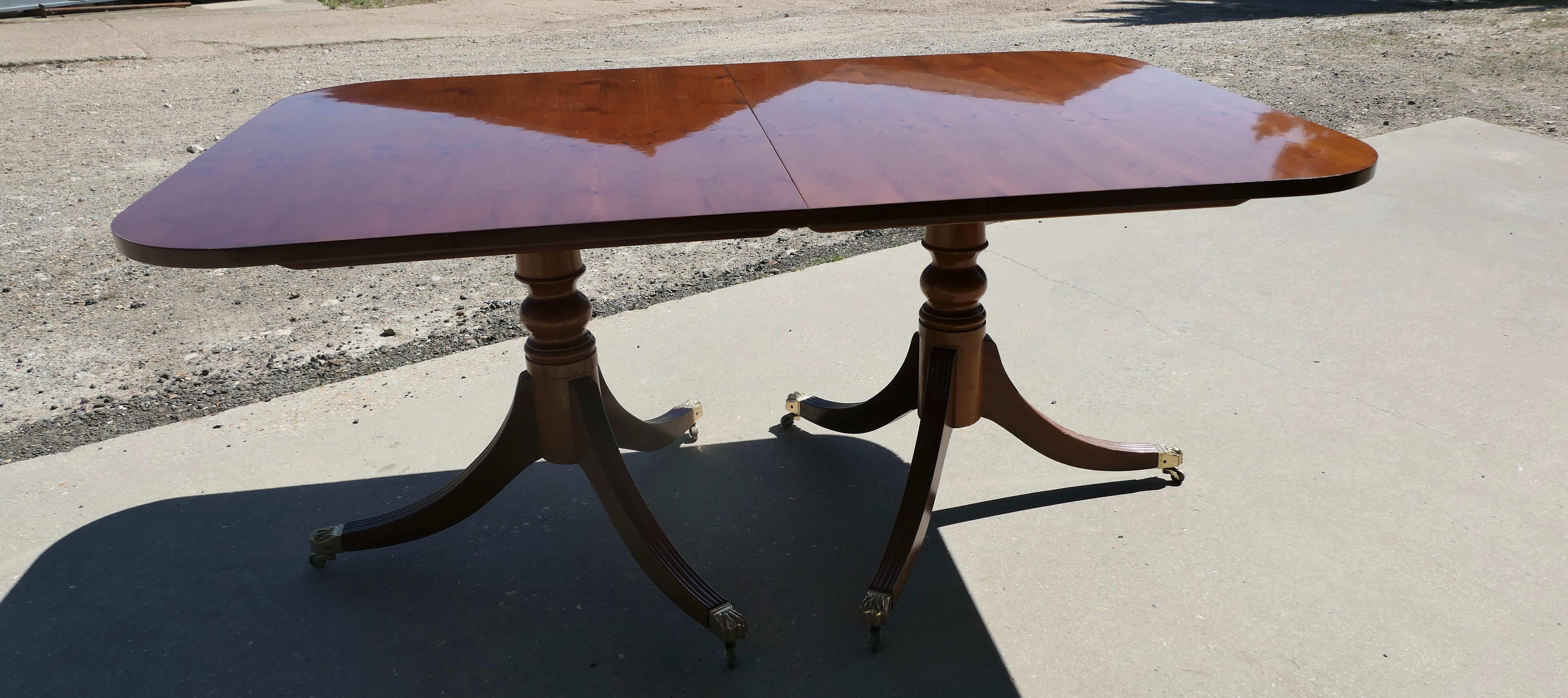 Yew Wood Pedestal Dining Table Extends to Seat 14 For Sale 1