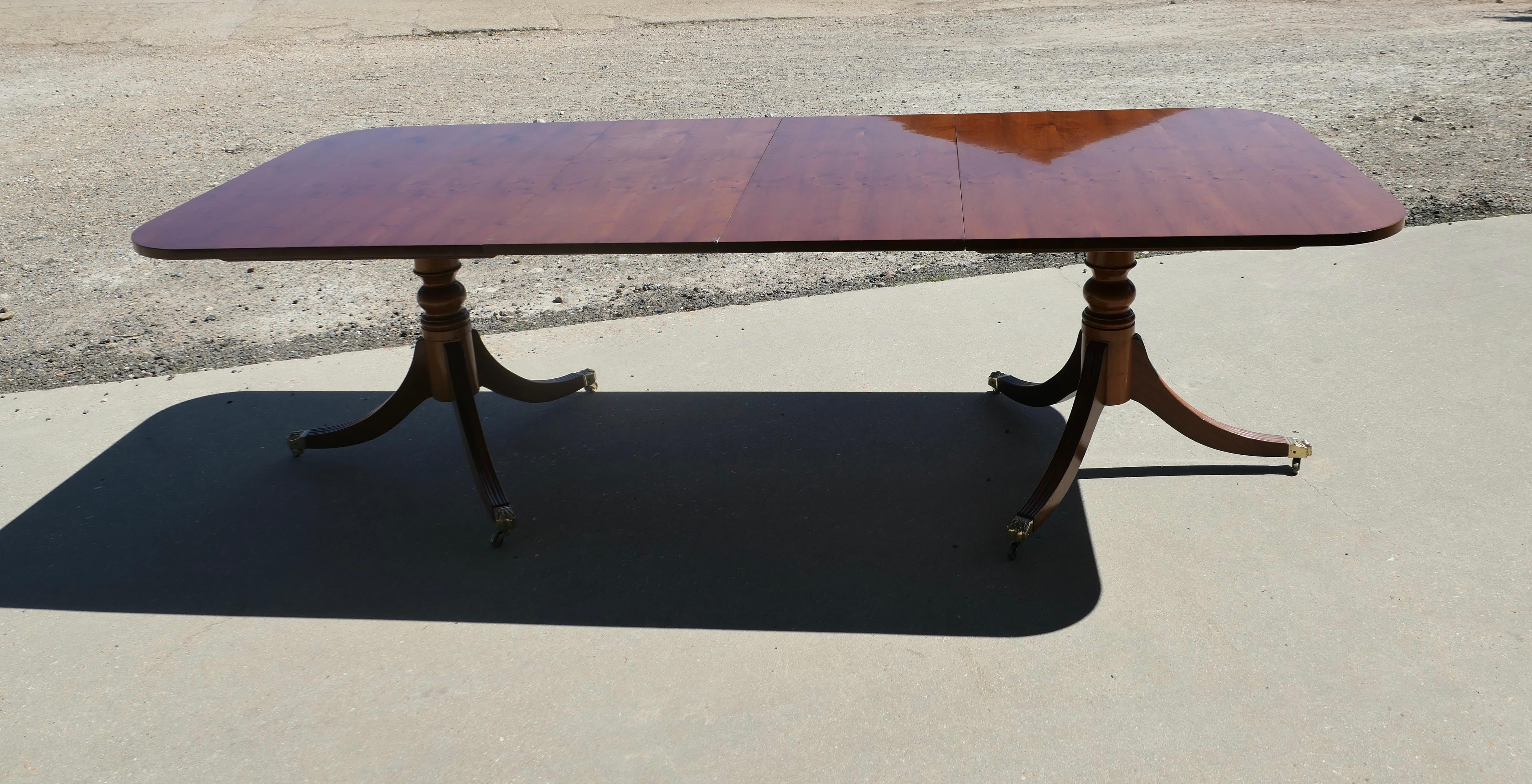 Yew Wood Pedestal Dining Table Extends to Seat 14 For Sale 3