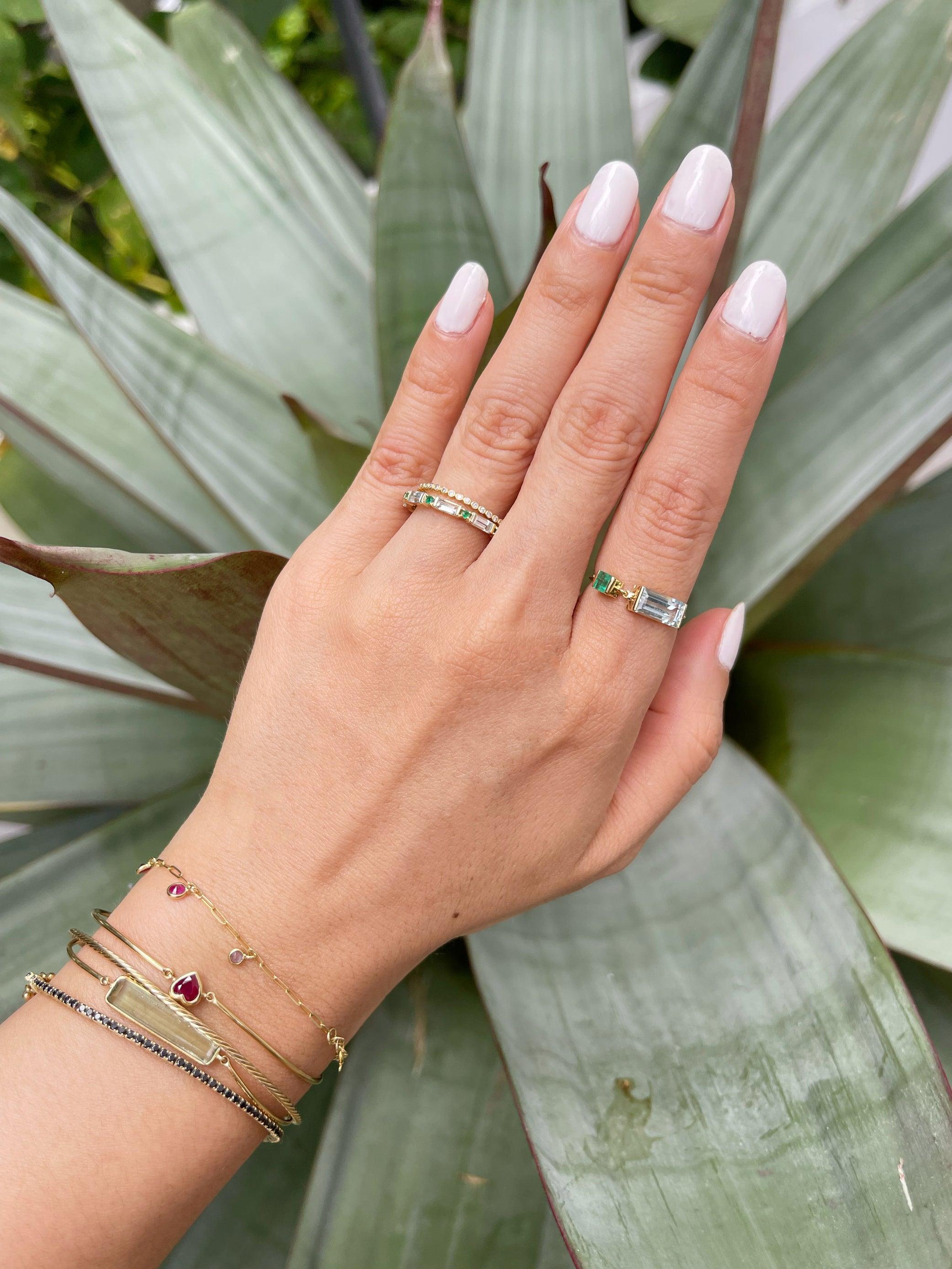 Our signature chain ring in a refreshing combination of aquamarine & emerald. Our mighty chain ring means you can wear it to every occasion for every need. We wear ours even to the gym. 


Aquamarines have the energy to cleanse and soothe while