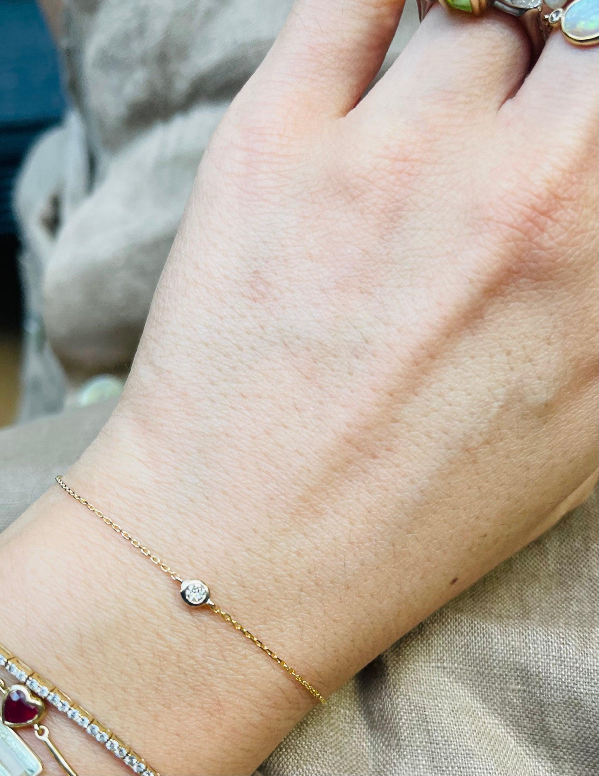 She’s as cute as a button! This perfectly versatile bracelet is the perfect addition to any wrists stack. Made in sold gold with a dazzling brilliant cut diamond, this bracelet is sure to charm any wearer. 


We made this cute little number to add