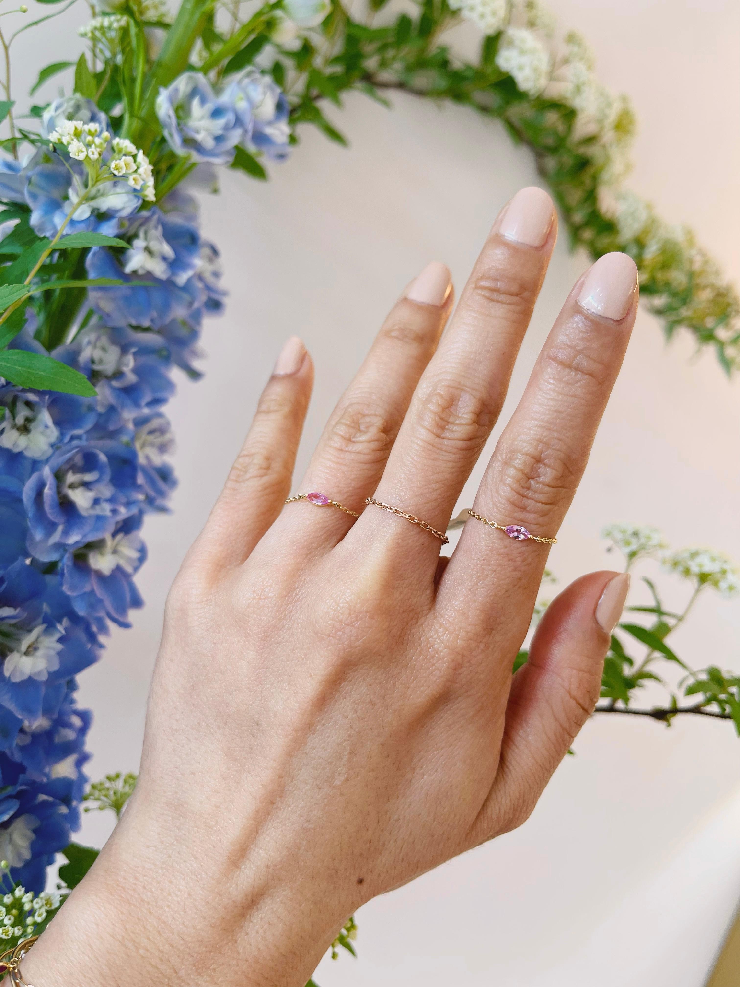  Our new Pink Sapphire petite marquise chain ring is the perfect shade of pink. Its delicate marquise cut packs a whole lot of shine. These sapphires have been hand-selected from Sri Lanka, the world’s best source for sapphires. These gorgeous