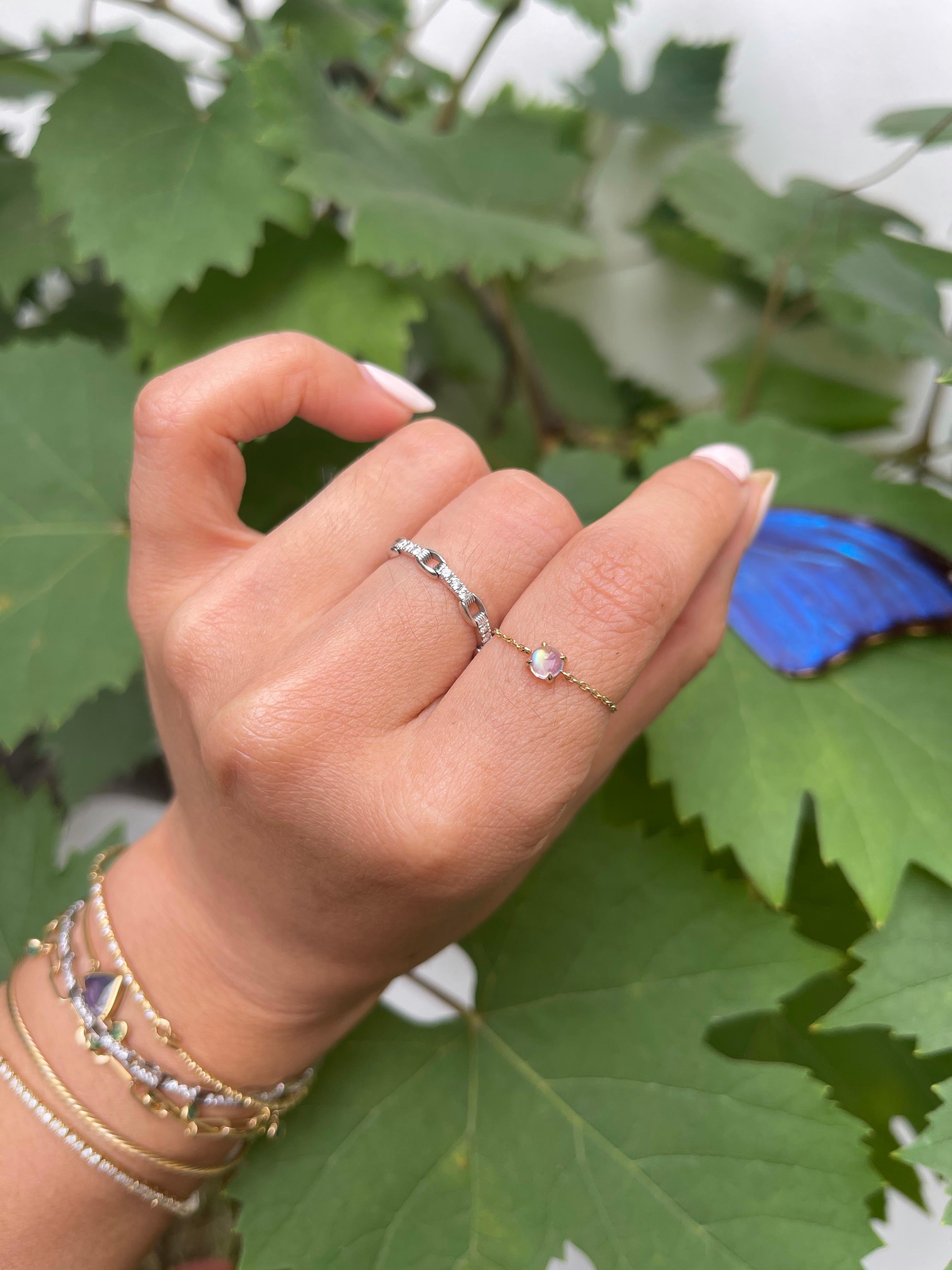 This is what dreams are made of. A perfectly formed gemstone with flashes of blue make this an extra rare gem. This is a magical gemstone which enhances intuition & awareness. 


Wear it along or stack it one of our chain rings from the Dot
