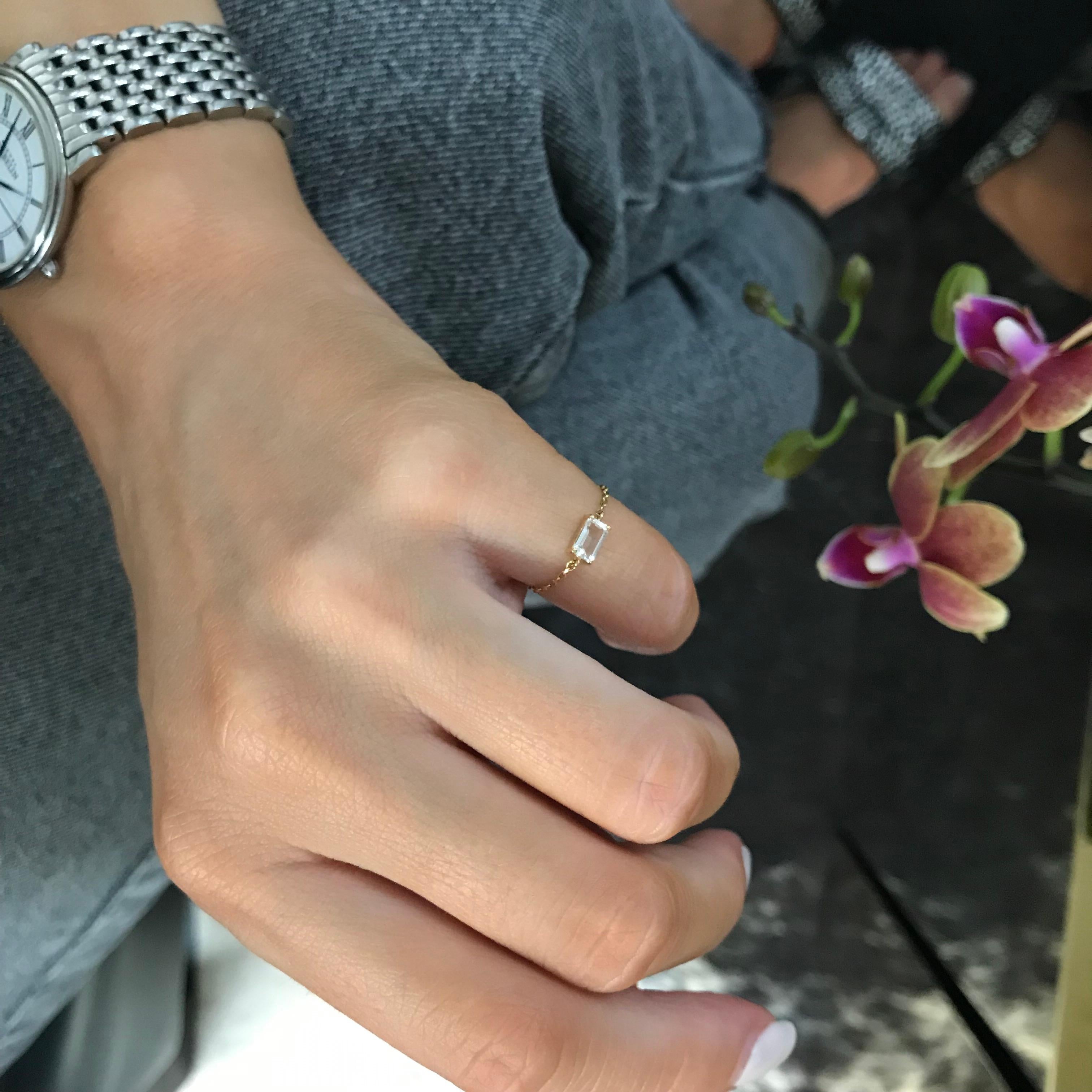 Yi Collection gemstones are all hand-selected from all around the world. This dazzling white topaz shines brilliantly like a diamond. Wear yours stacked or alone for a very modern look. We call these chain rings “mighty” for a reason. They are