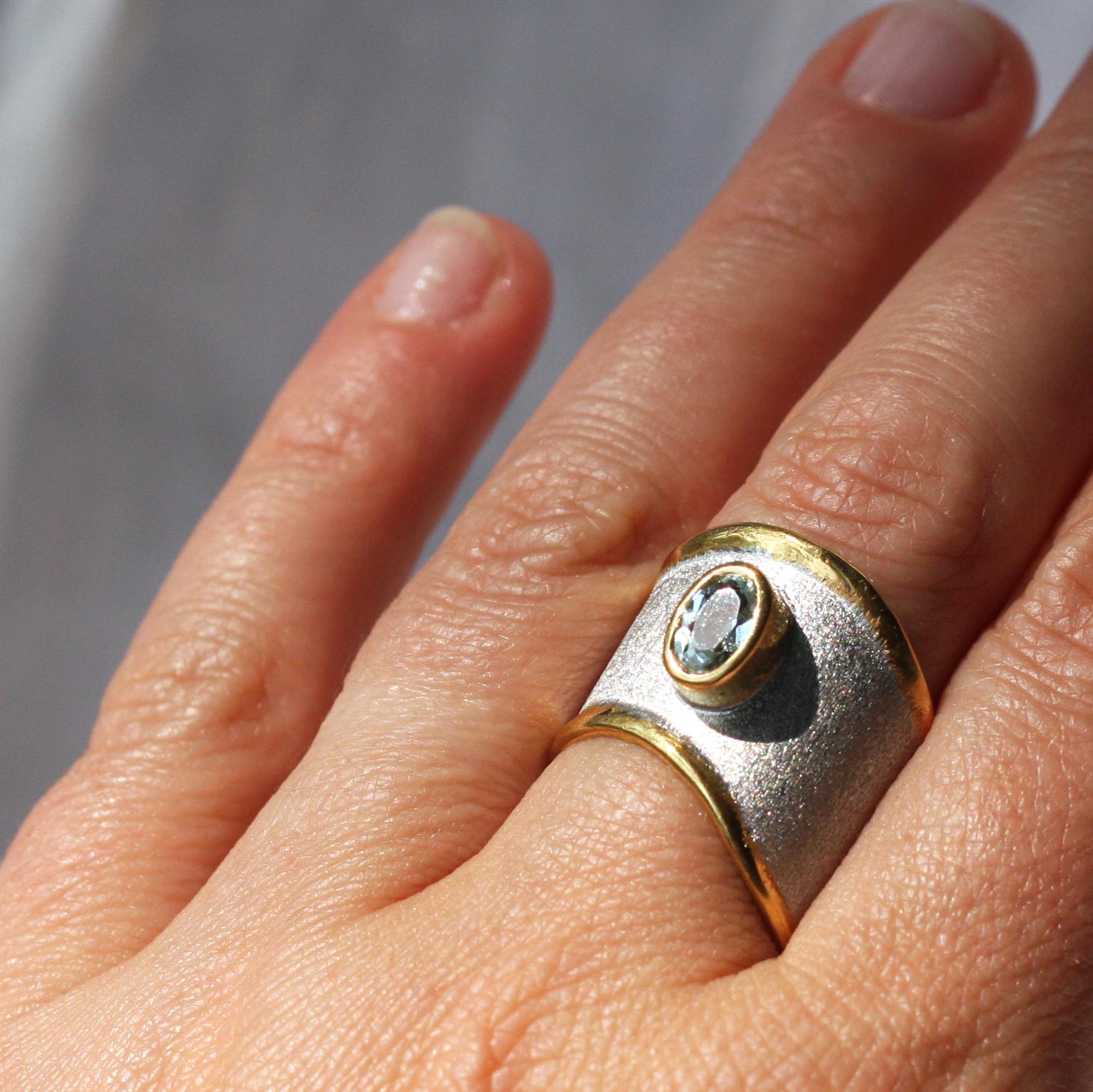 Introducing Yianni Creations Midas Collection handmade artisan ring from fine silver 950 purity plated with palladium to resist the elements. Liquid edges are decorated with an overlay of 24 Karat yellow gold contrasting with a brushed texture of