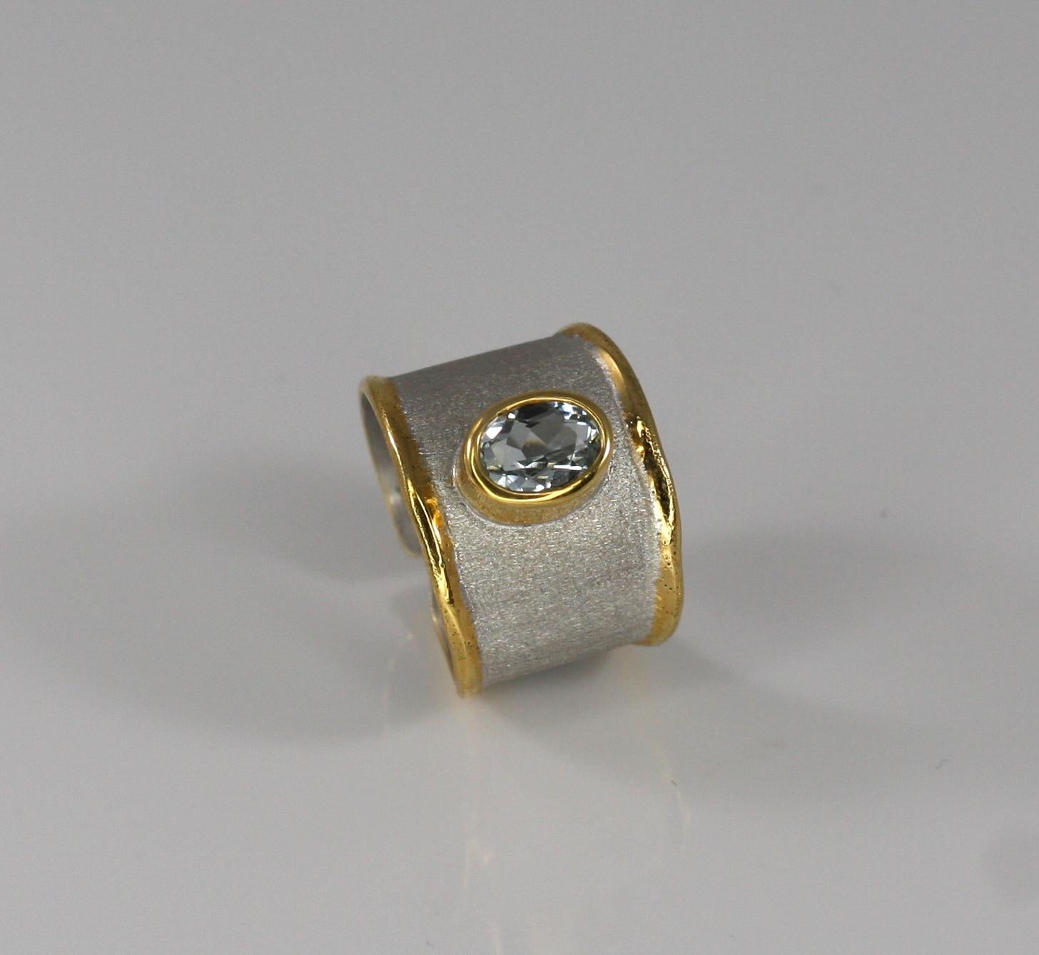 This is Yianni Creations ring with oval-shaped 1.10 Carat Aquamarine crafted from fine silver 950 purity and plated with palladium to protect the ring from the elements. The unique look is completed by special shiny velvet background together with