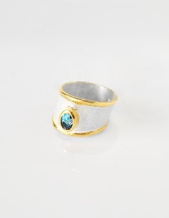 Yianni Creations London Blauer Topas feines Silber und 24 Karat Gold Band Ring