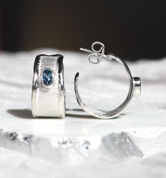 Yianni Creations Oval Blue Topaz Fine Silver Palladium Hoop Earrings