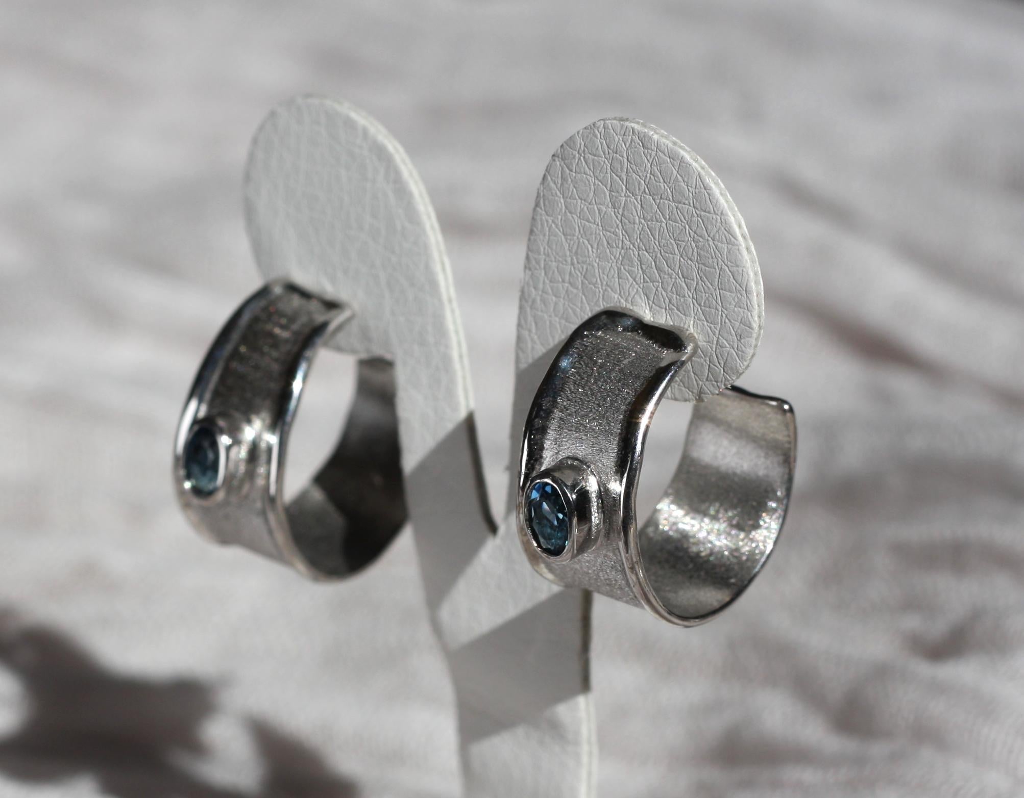 Oval Cut Yianni Creations Oval Blue Topaz Fine Silver Palladium Hoop Earrings For Sale