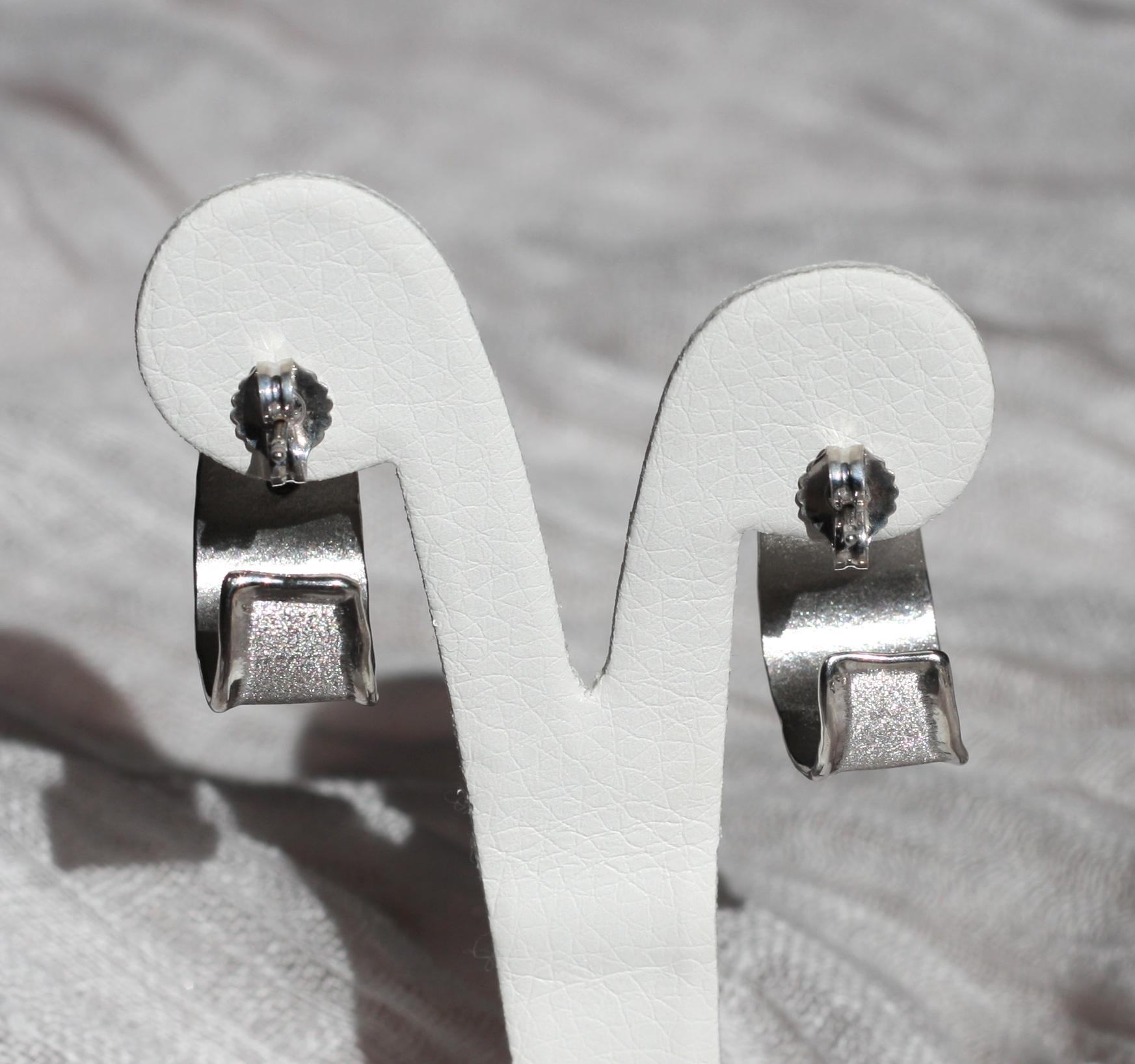 Women's Yianni Creations Oval Blue Topaz Fine Silver Palladium Hoop Earrings For Sale