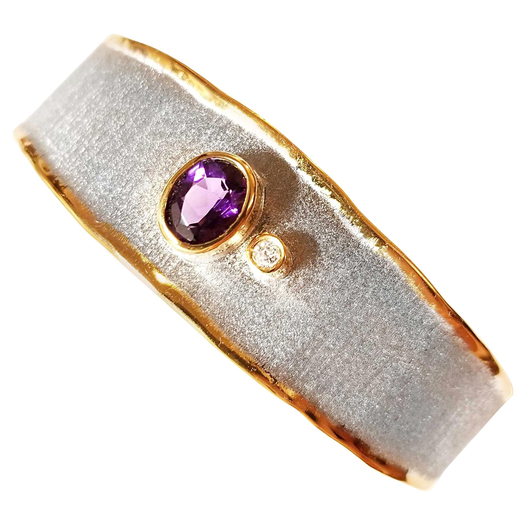 Yianni Creations Midas Collection 100% Handmade Artisan Bangle Bracelet from Fine Silver with a layover of 24 Karat Yellow Gold features 1.25 Carat Oval cut Amethyst accompanied by 0.03 Carat Brilliant cut Diamond complemented by unique techniques