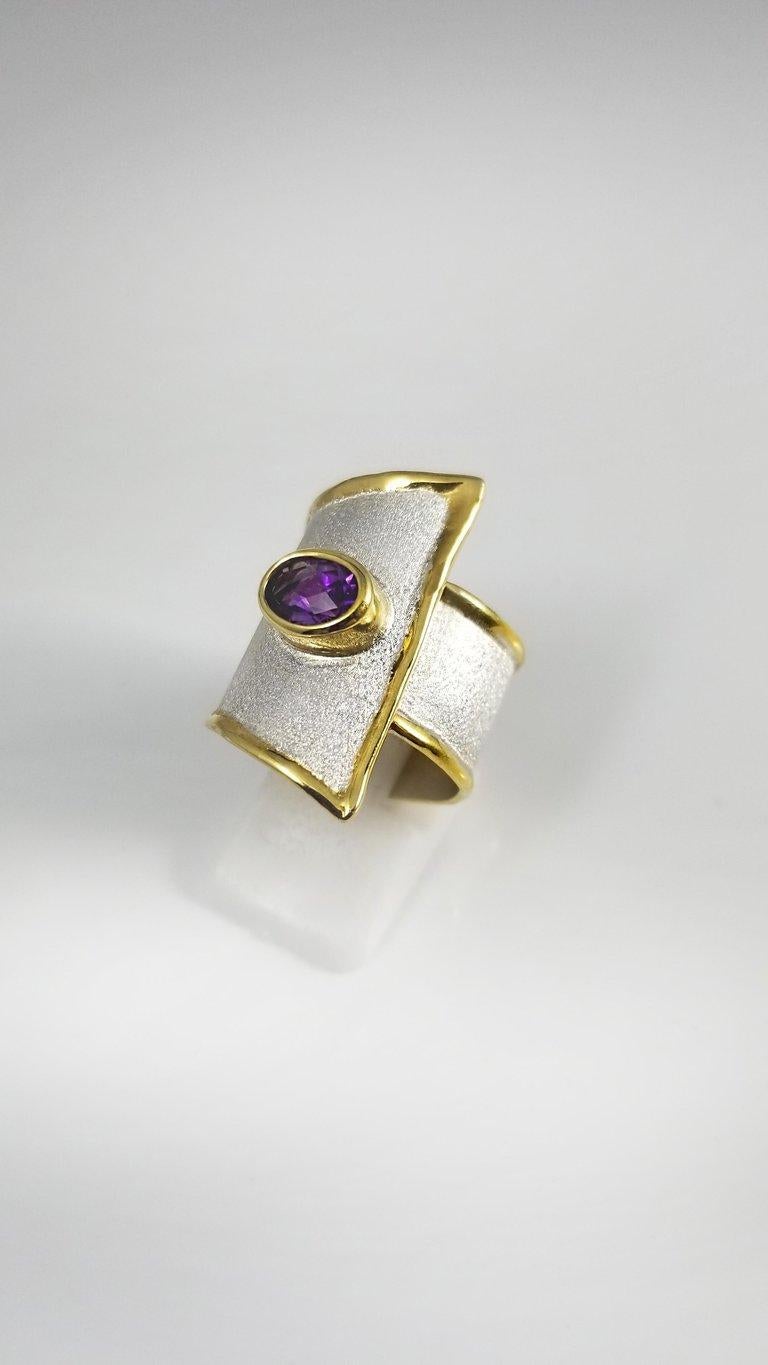 This is Yianni Creations Midas Collection handcrafted artisan ring from fine silver 950 purity plated with palladium to protect it from the elements. The ring features 1.25 Carat Amethyst complemented by unique techniques of craftsmanship - brushed