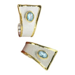 Yianni Creations Ohrringe mit ovalem Aquamarin aus feinem Silber und 24 Karat Gold