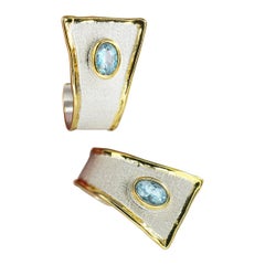 Yianni Creations Ohrringe mit ovalem Aquamarin aus feinem Silber und 24 Karat Gold