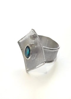 Yianni Creations Londres Topacio azul y diamante Anillo ancho de plata fina y paladio