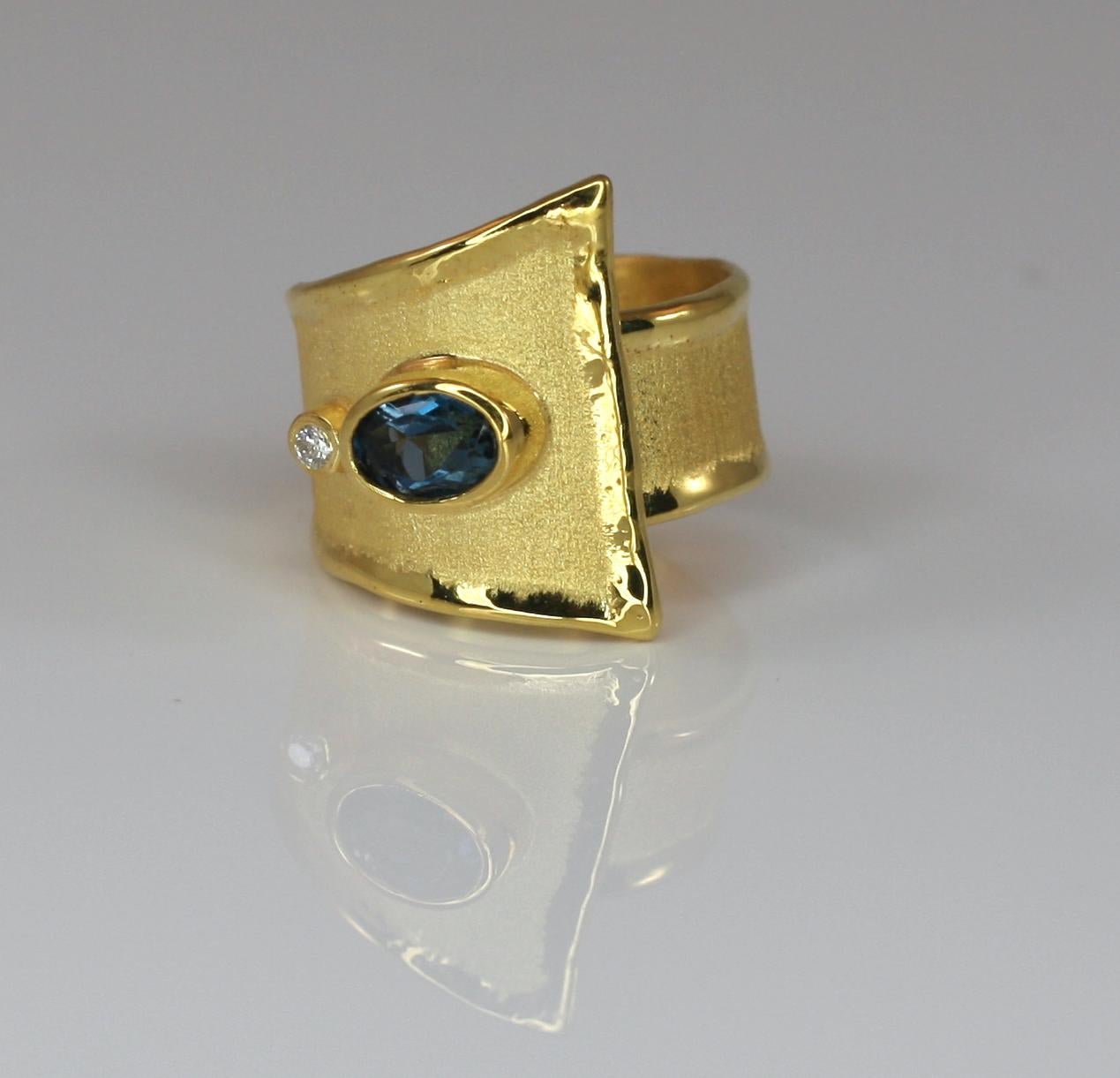 Contemporary Yianni Creations 18 Karat Blue Topaz and Diamond Adjustable Wide Band Ring For Sale