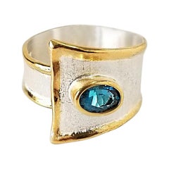 Yianni Creations 1.60 Carat Blue Topaz Ring in Fine Silver 24 Karat Gold 