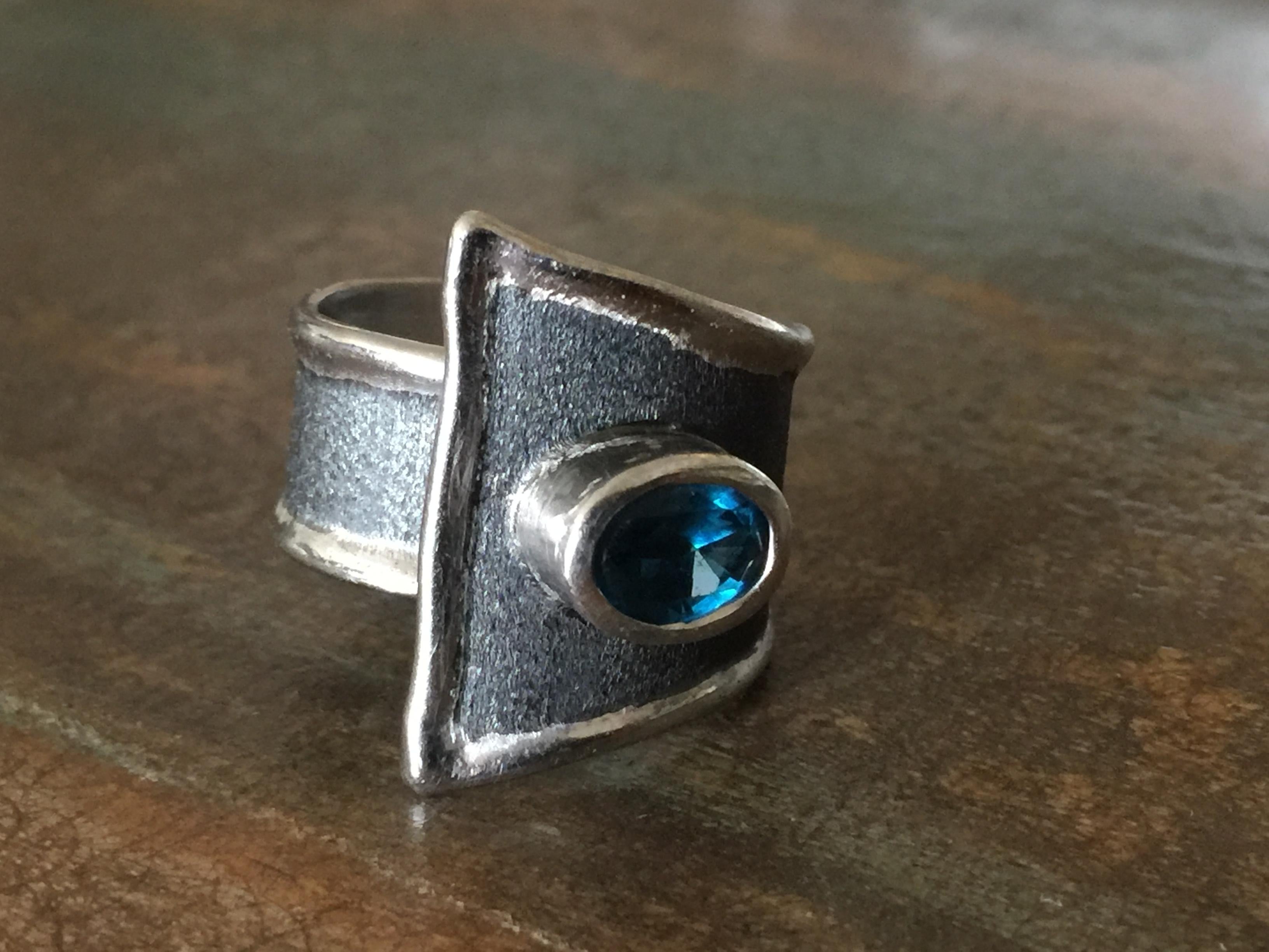 Oval Cut Yianni Creations Blue Topaz Fine Silver and Black Rhodium Wide Band Ring For Sale