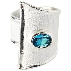 Yianni Creations Bague à large anneau en argent fin et palladium avec topaze bleue ovale de Londres