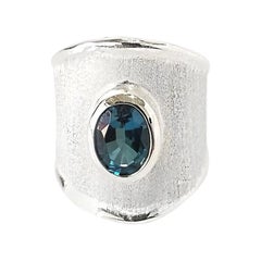 Yianni Creations Oval Blue Topaz Fine Silver and Palladium Wide Band Ring