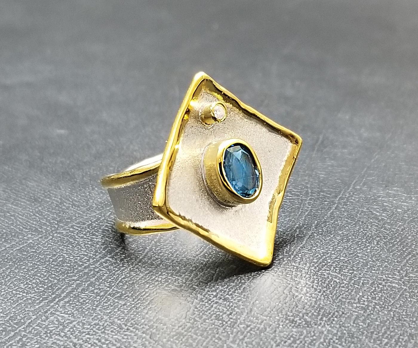 Oval Cut Yianni Creations Blue Topaz and Diamond Fine Silver 24 Karat Gold Two Tone Ring For Sale
