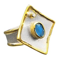 Yianni Creations Blue Topaz and Diamond Fine Silver 24 Karat Gold Two Tone Ring