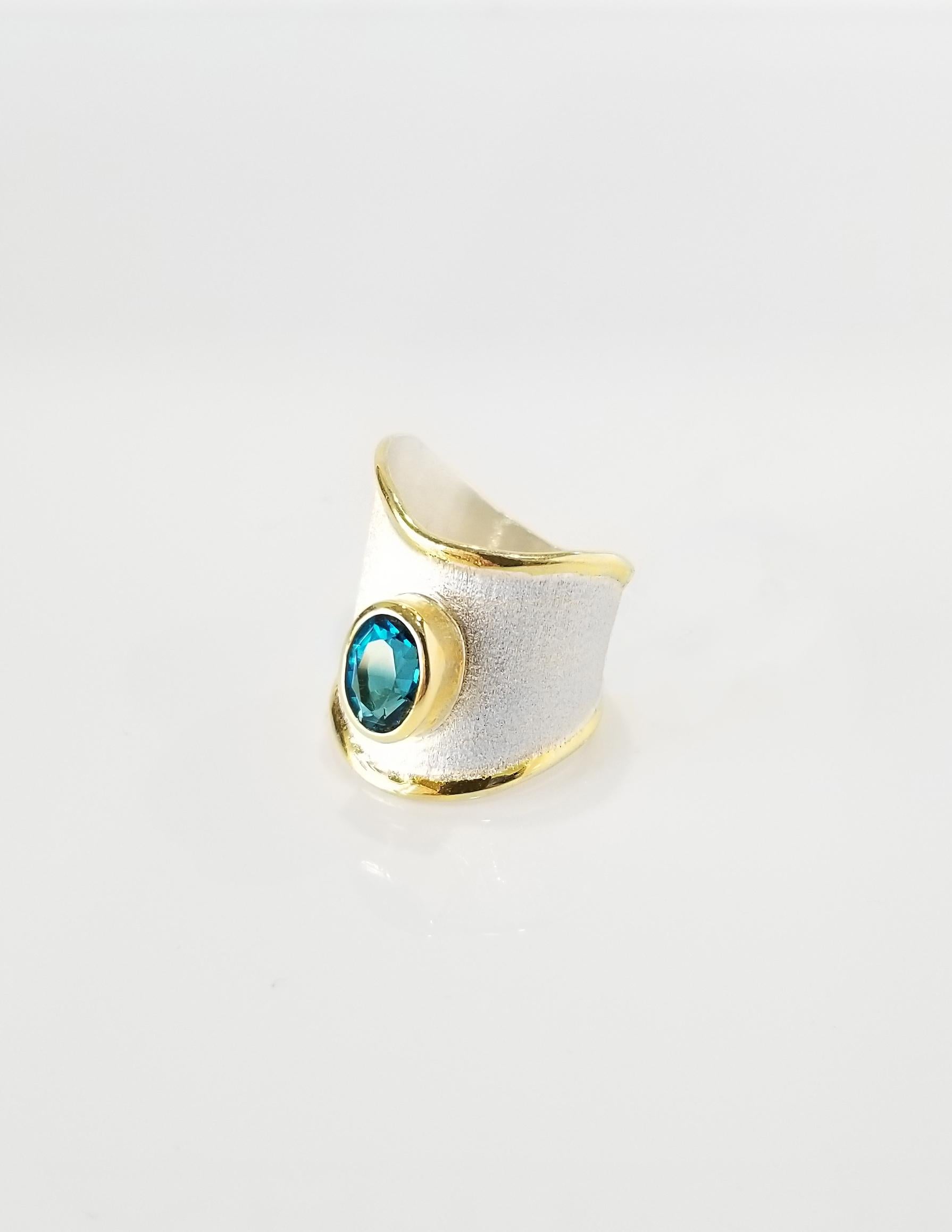 Introducing Yianni Creations Midas Collection handmade artisan ring from fine silver 950 purity plated with palladium to resist the elements. Liquid edges carry an overlay of 24 karats yellow gold contrasting with a brushed texture of the surface.
