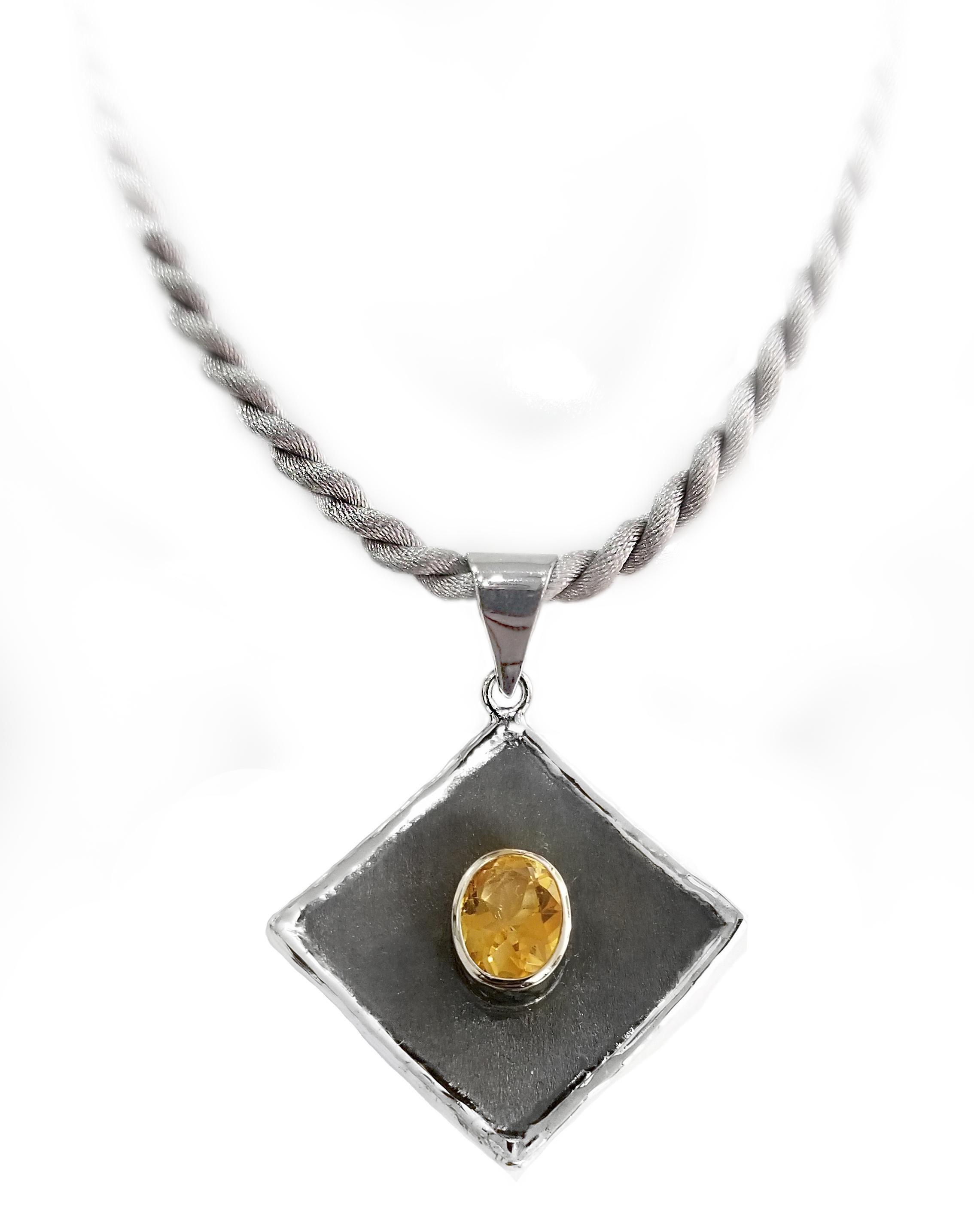 Yianni Creations Hephestos Collection 100% Handmade Artisan Pendant from Fine Silver featuring 1.75 Carat Oval Cut Citrine contrasting on Black Oxidized background. Gem get complemented by unique techniques of craftsmanship - brushed texture and