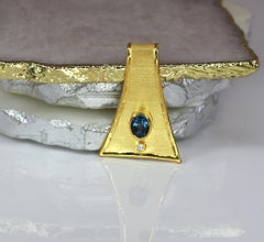 Yianni Creations 18 Karat Gold Pendant Necklace with Blue Topaz and Diamond