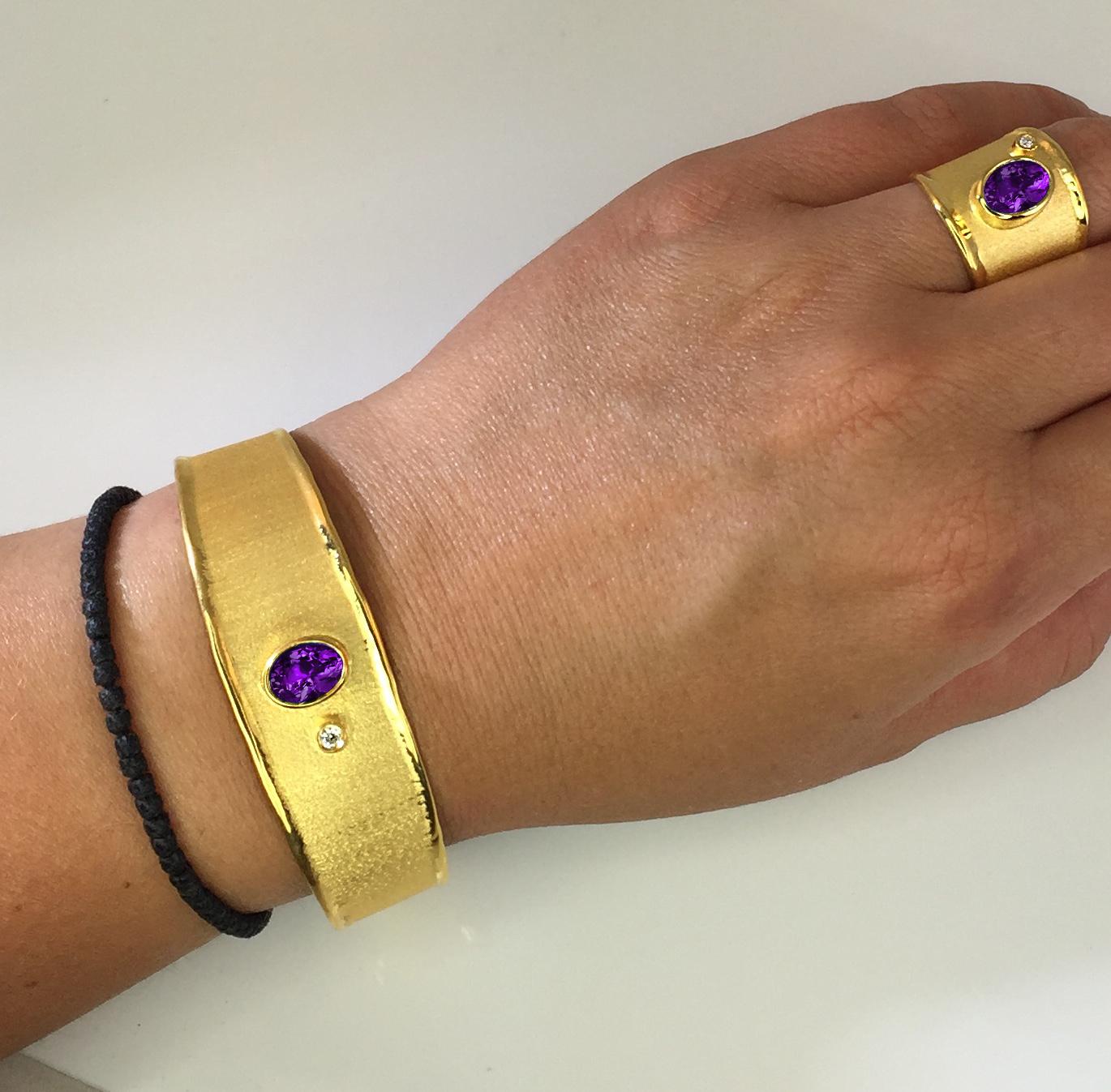 Yianni Creations 18 Karat Solid Gold Bracelet and Ring are all handcrafted in our workshop in Greece. This stunning artisan bracelet and ring feature respectively each an oval cut Amethyst the weight of 1.75 Carat and 1.25 Carat accompanied by a