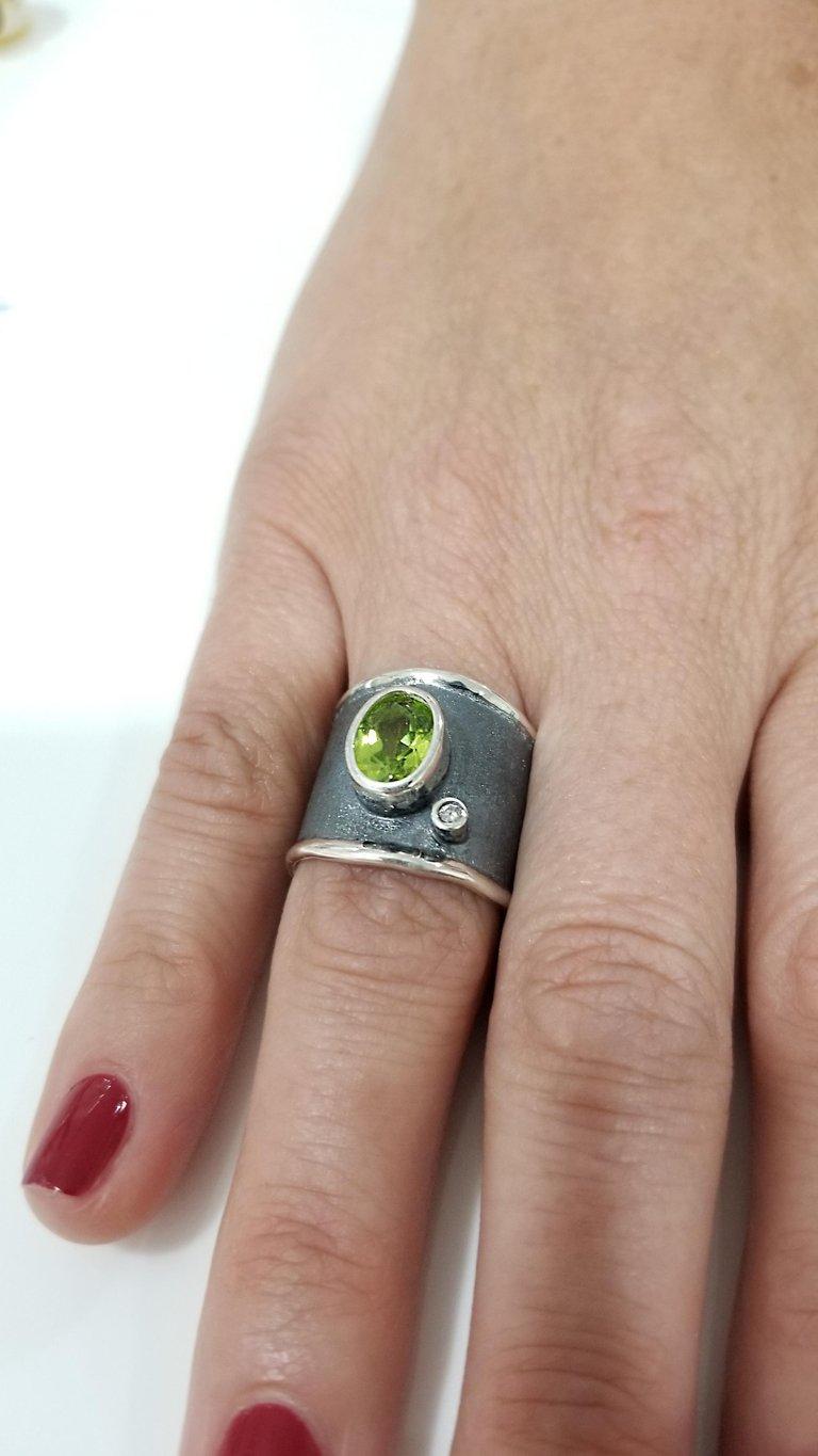 Contemporary Yianni Creations Peridot and Diamond Fine Silver Black Rhodium Wide Band Ring For Sale