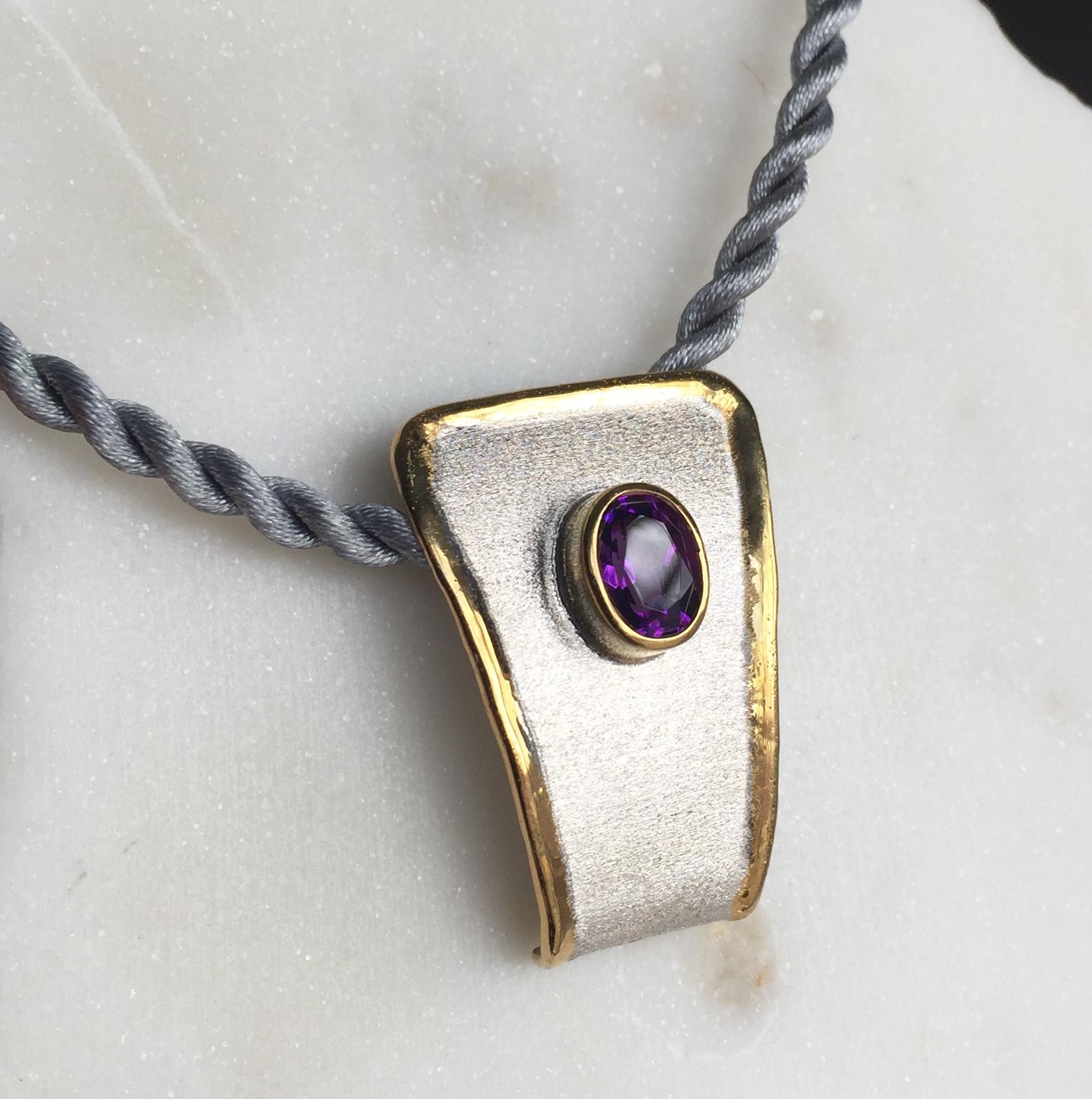 Yianni Creations pendant enhancer from Midas Collection is all handcrafted from fine silver 950 purity and plated with palladium to resist the elements. This stunning artisan pendant attracts by brushed texture and nature-inspired liquid edges in