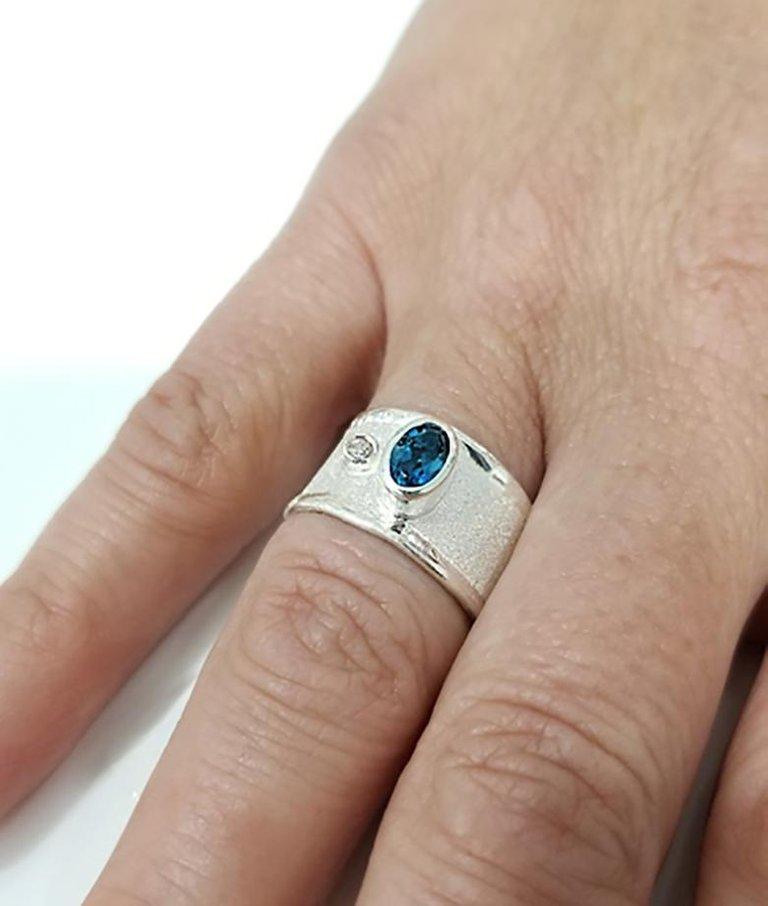Oval Cut Yianni Creations Blue Topaz and Diamond Fine Silver Palladium Band Ring For Sale