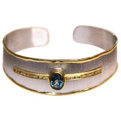 Yianni Creations Blue Topaz Diamonds Silver and Gold Two-Tone Bangle Bracelet