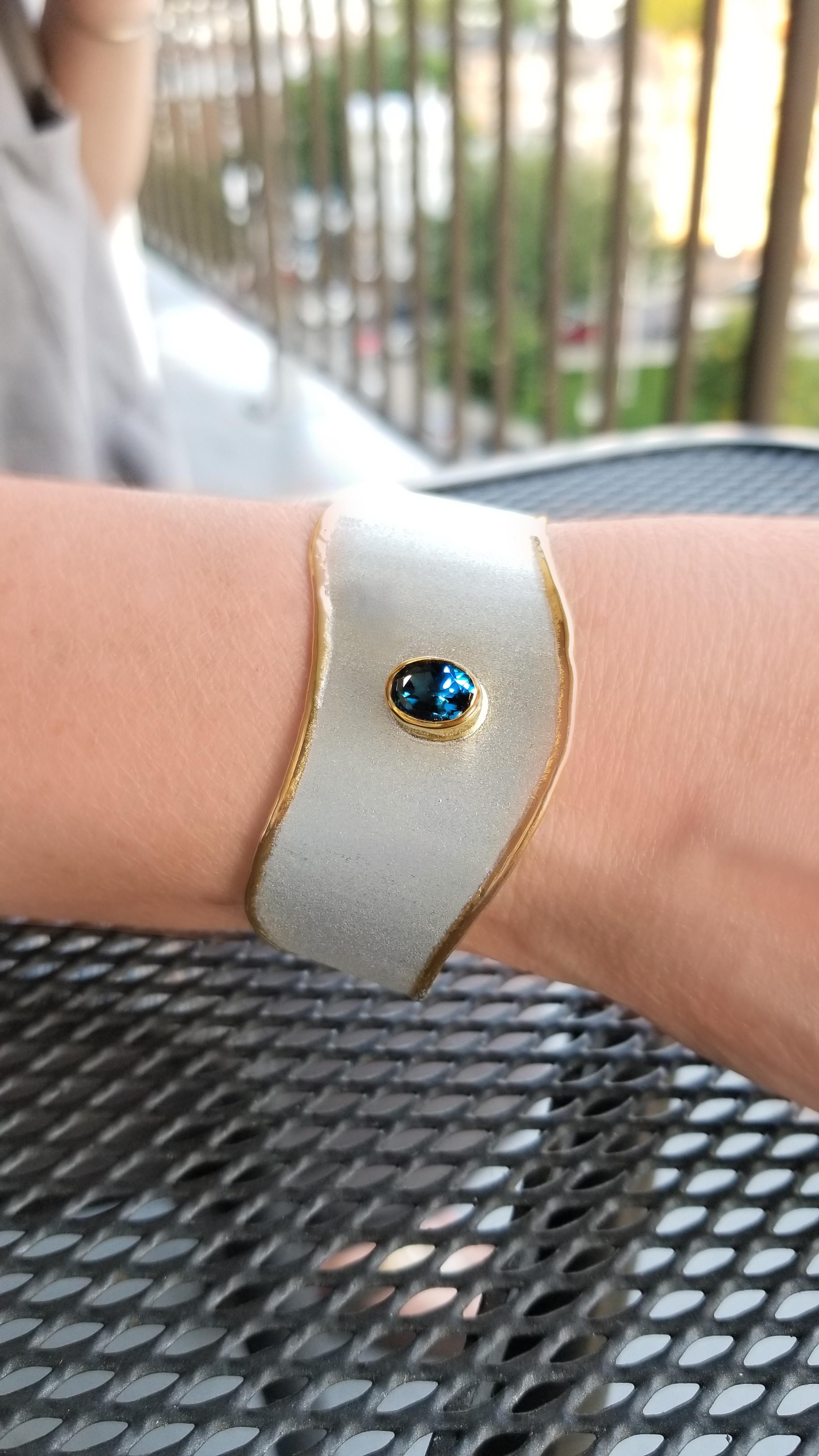 Oval Cut Yianni Creations Blue Topaz Fine Silver and 24 Karat Gold Two-Tone Cuff Bracelet For Sale