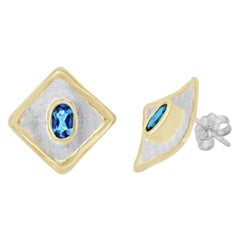 Yianni Creations Blue Topaz Two-Tone Earrings in Fine Silver and 24 Karat Gold